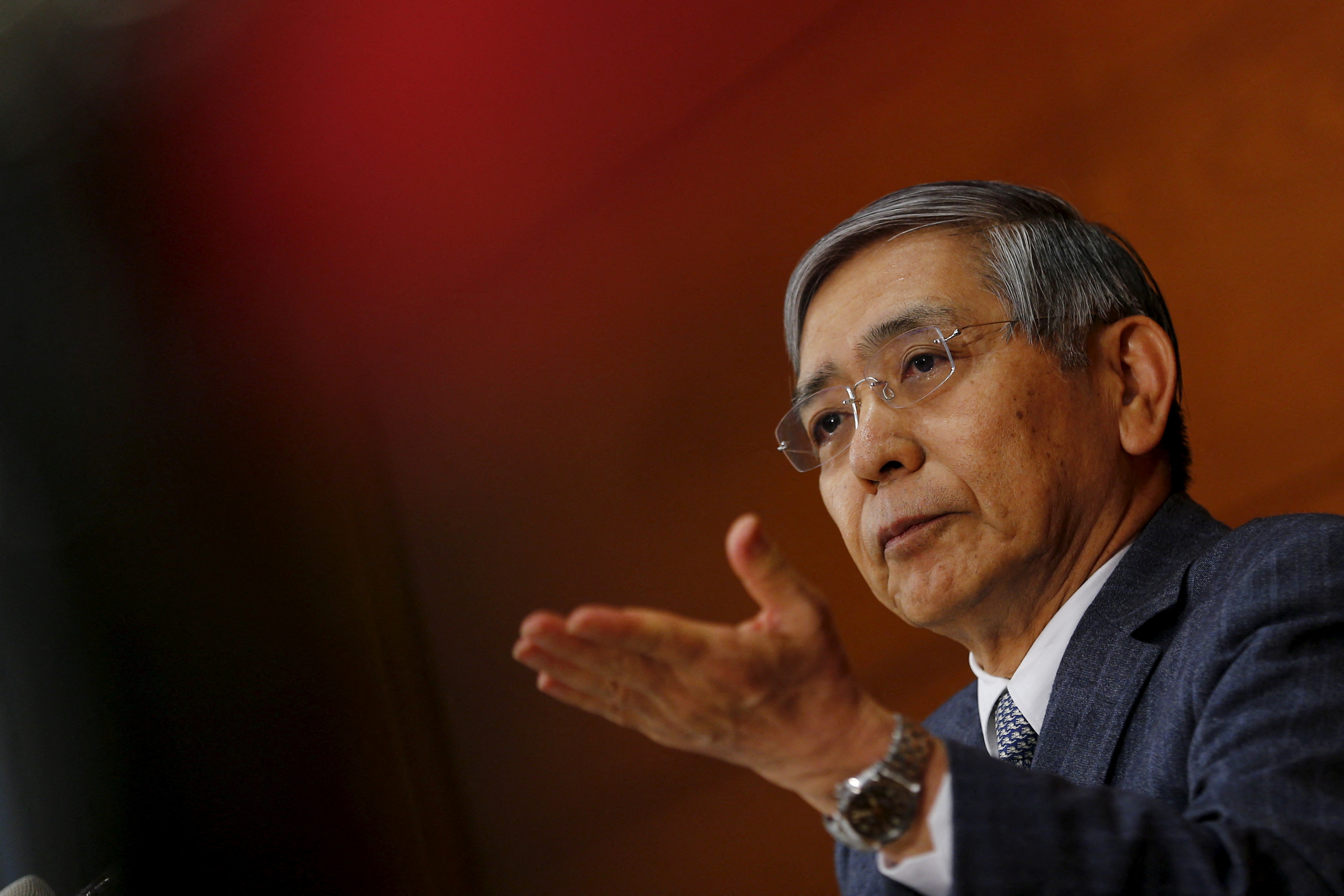 Bank of Japan (BOJ) Governor Haruhiko Kuroda takes a question during a news conference at the BOJ headquarters in Tokyo, October 30, 2015.  REUTERS/Thomas Peter/File Photo