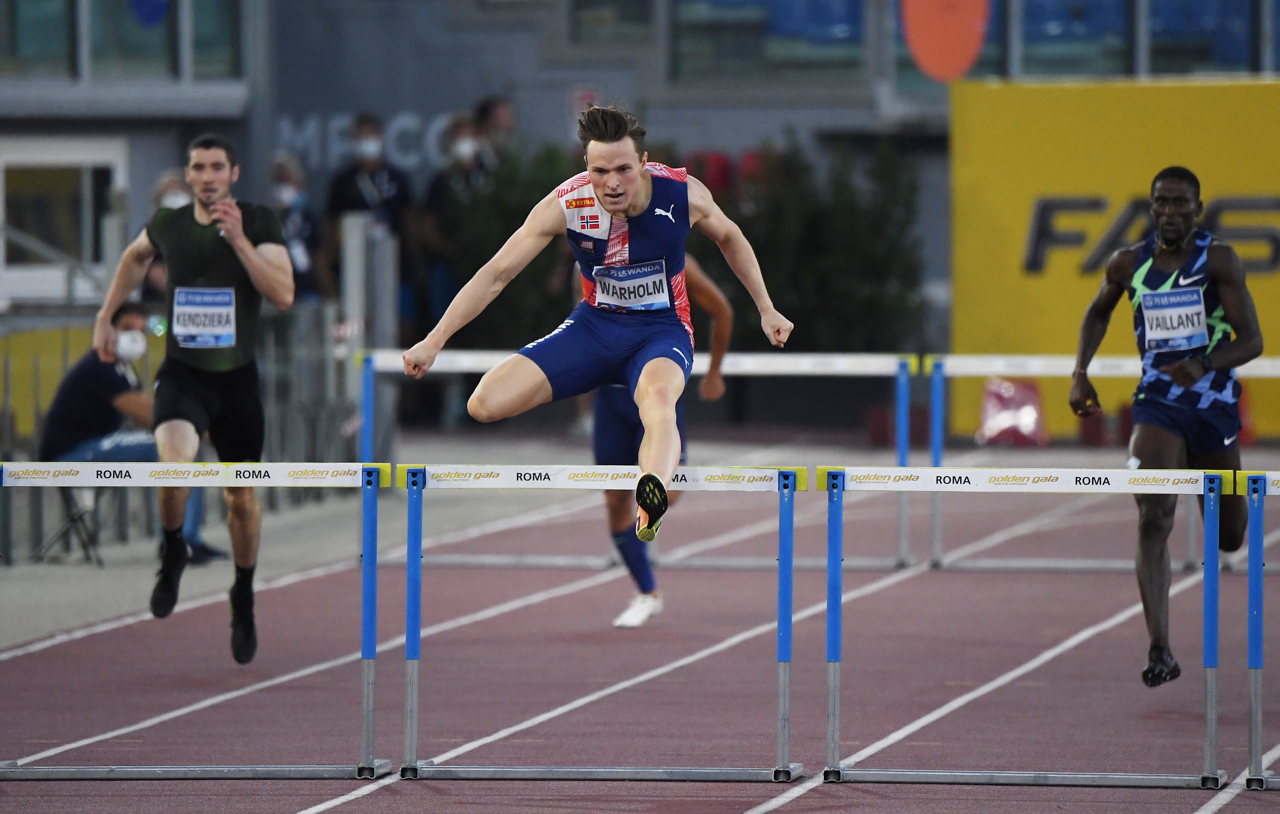 Warholm breaks 400 hurdles world record Reuters