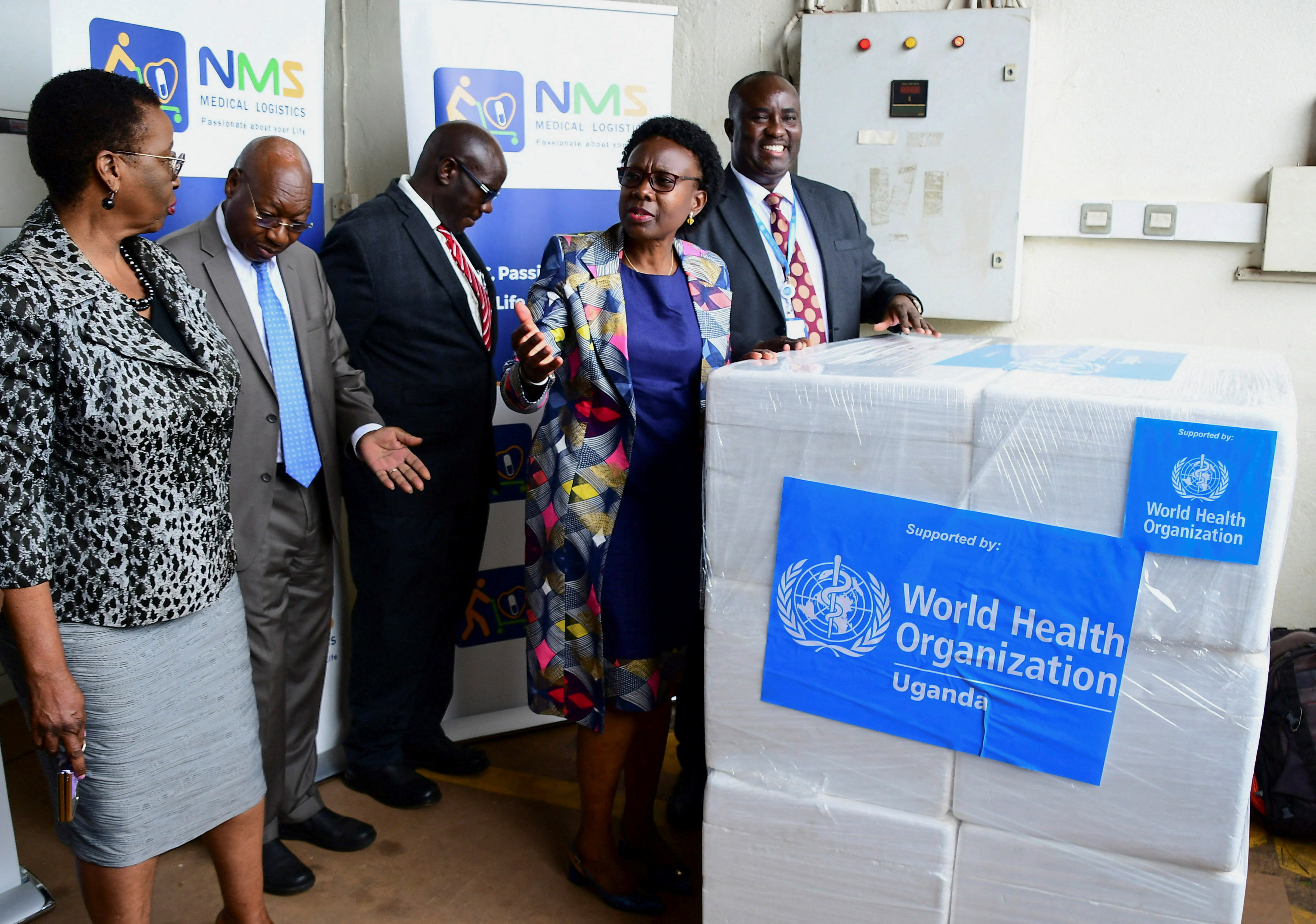 Uganda Health Minister Jane Ruth Aceng address the media after receiving a shipment of 1,200 doses for Ebola vaccine candidates set to be used in a clinical trial at the NMS in Entebbe