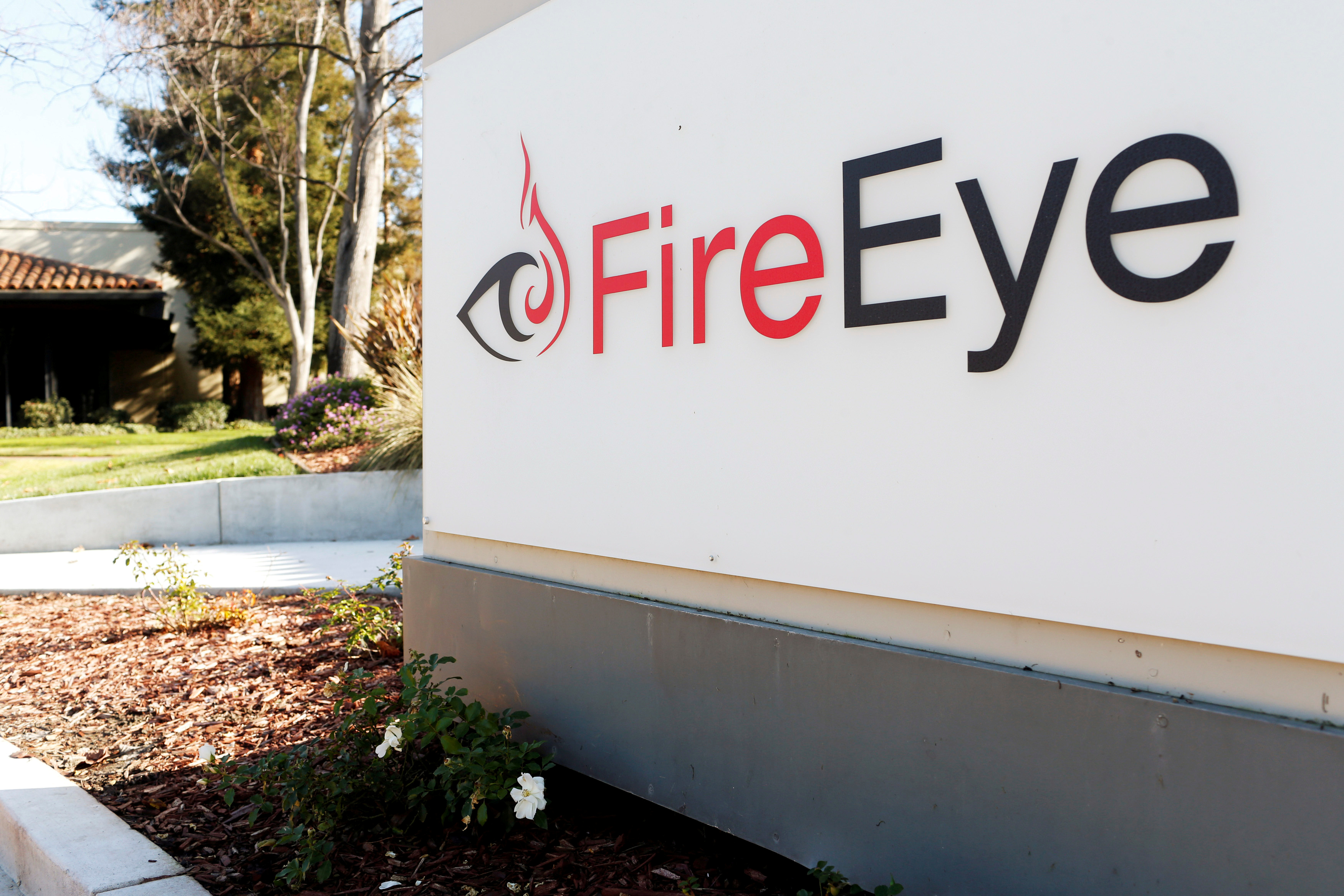 FireEye logo is seen outside the company's offices in Milpitas, California