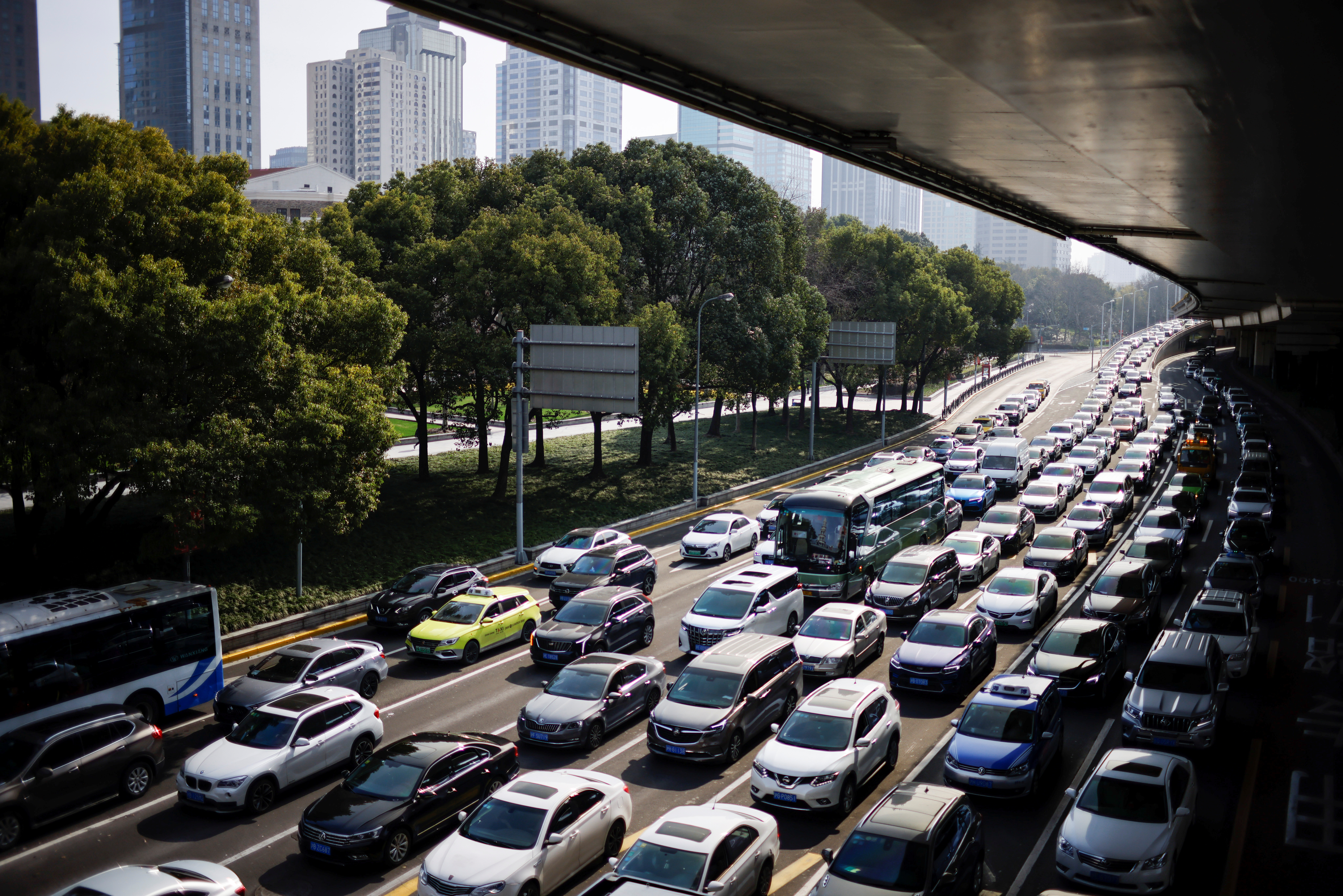 Cars wait in traffic in Shanghai