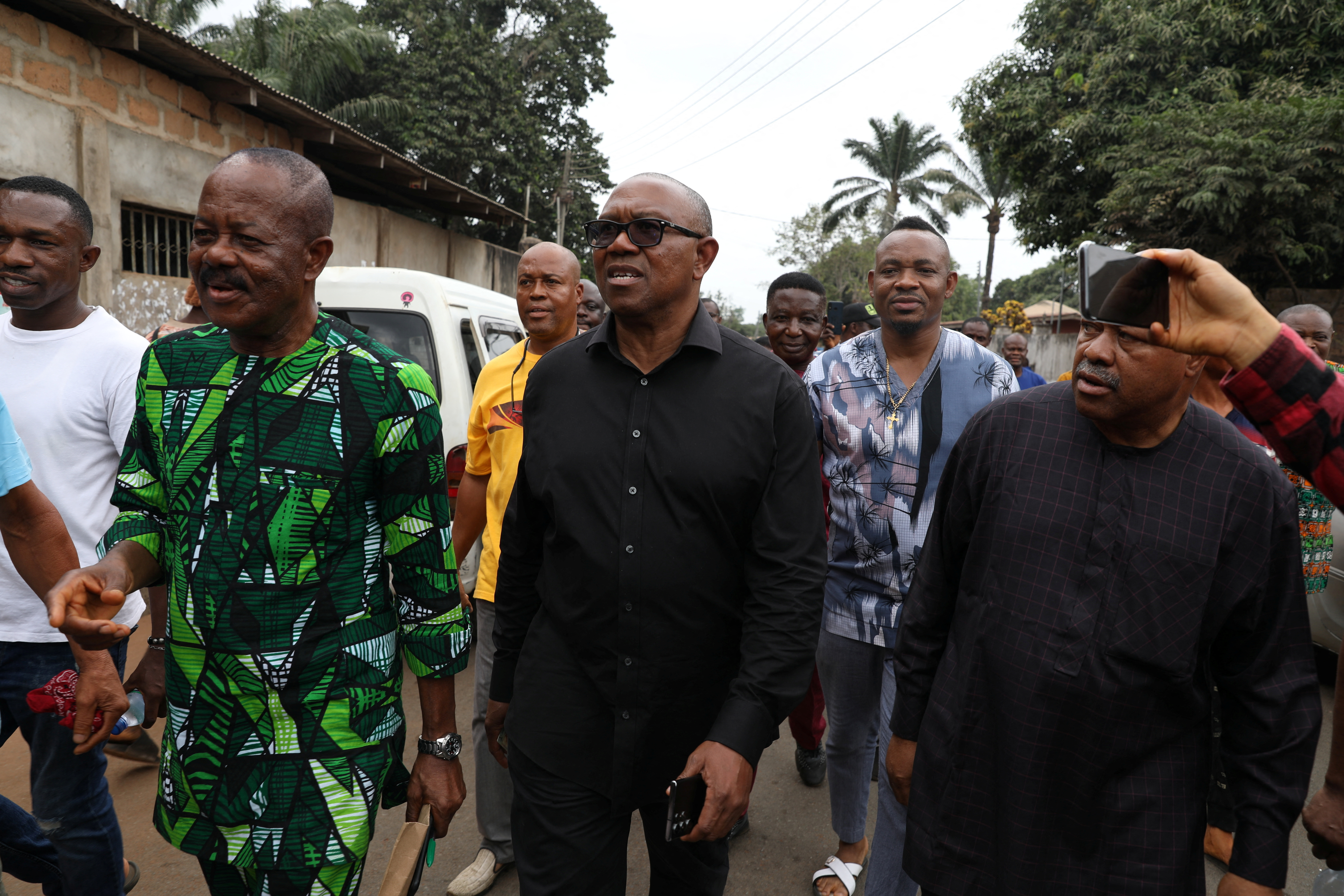 Labour Party (LP) Presidential candidate, Peter Obi, arrives at a polling unit to cast his vote during Nigeria's presidential election in his hometown in Agulu