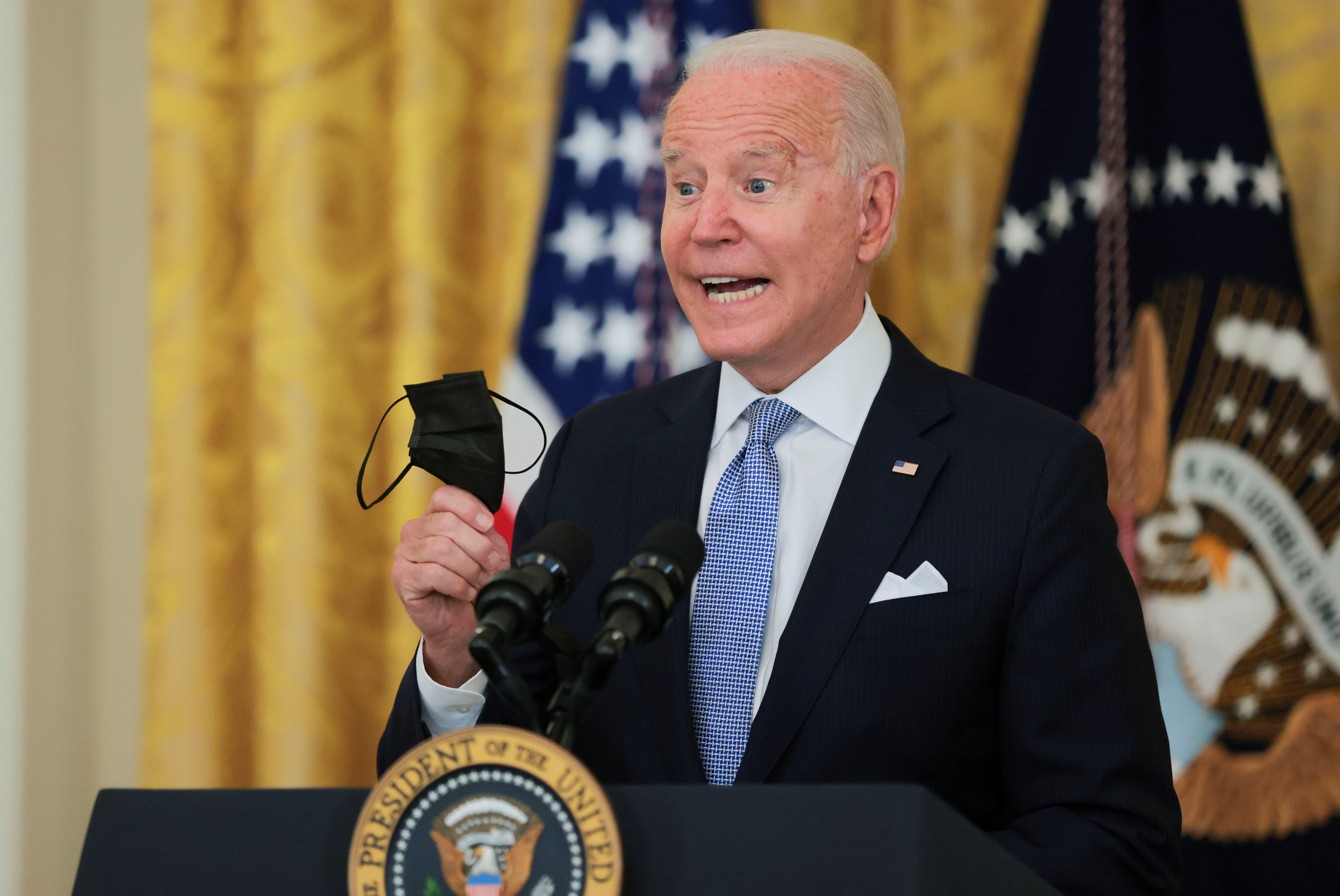 U.S. President Joe Biden speaks about the pace of coronavirus disease (COVID-19) vaccinations during remarks at the White House in Washington