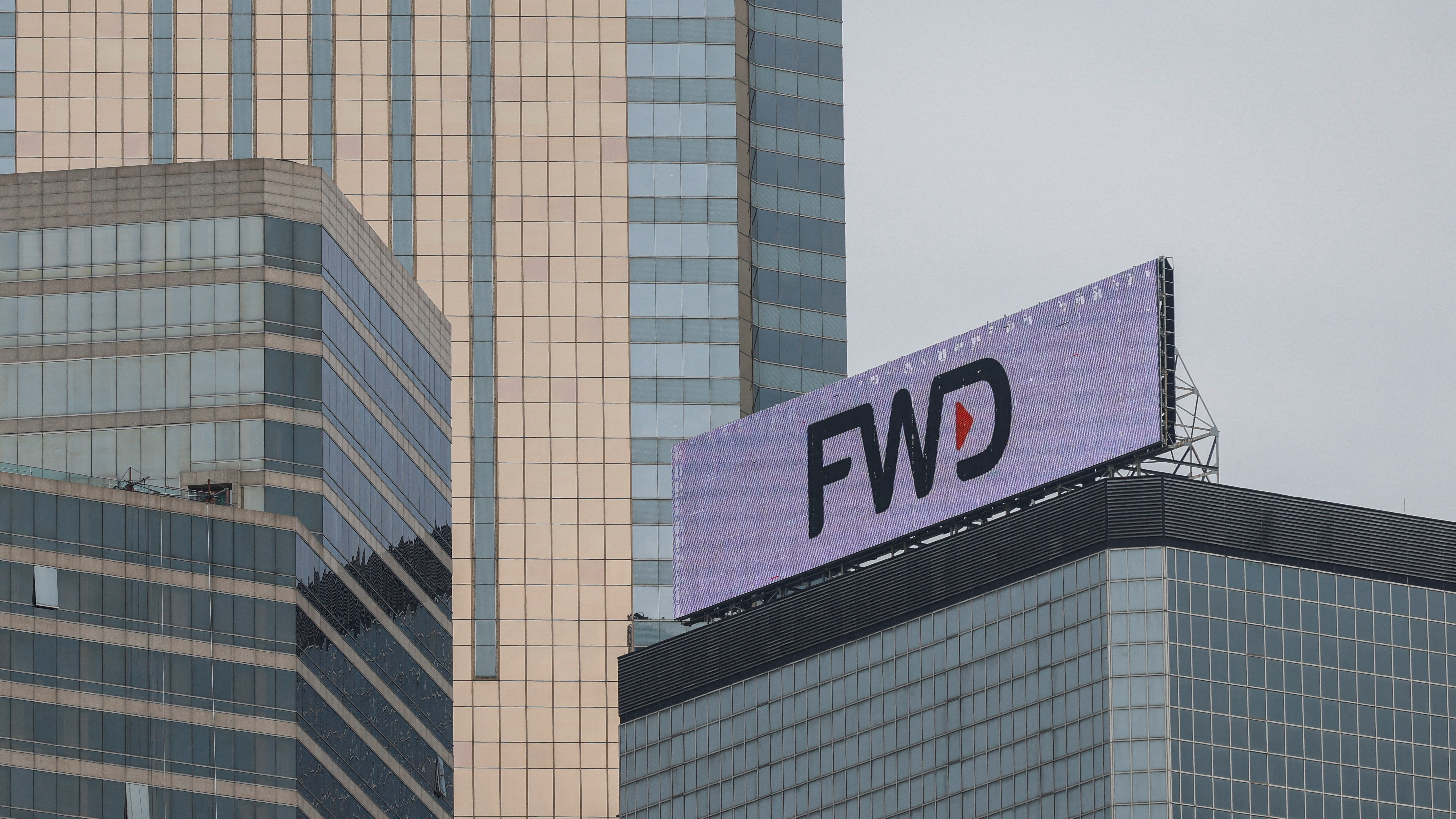 The logo of FWD group is seen on a building in Hong Kong