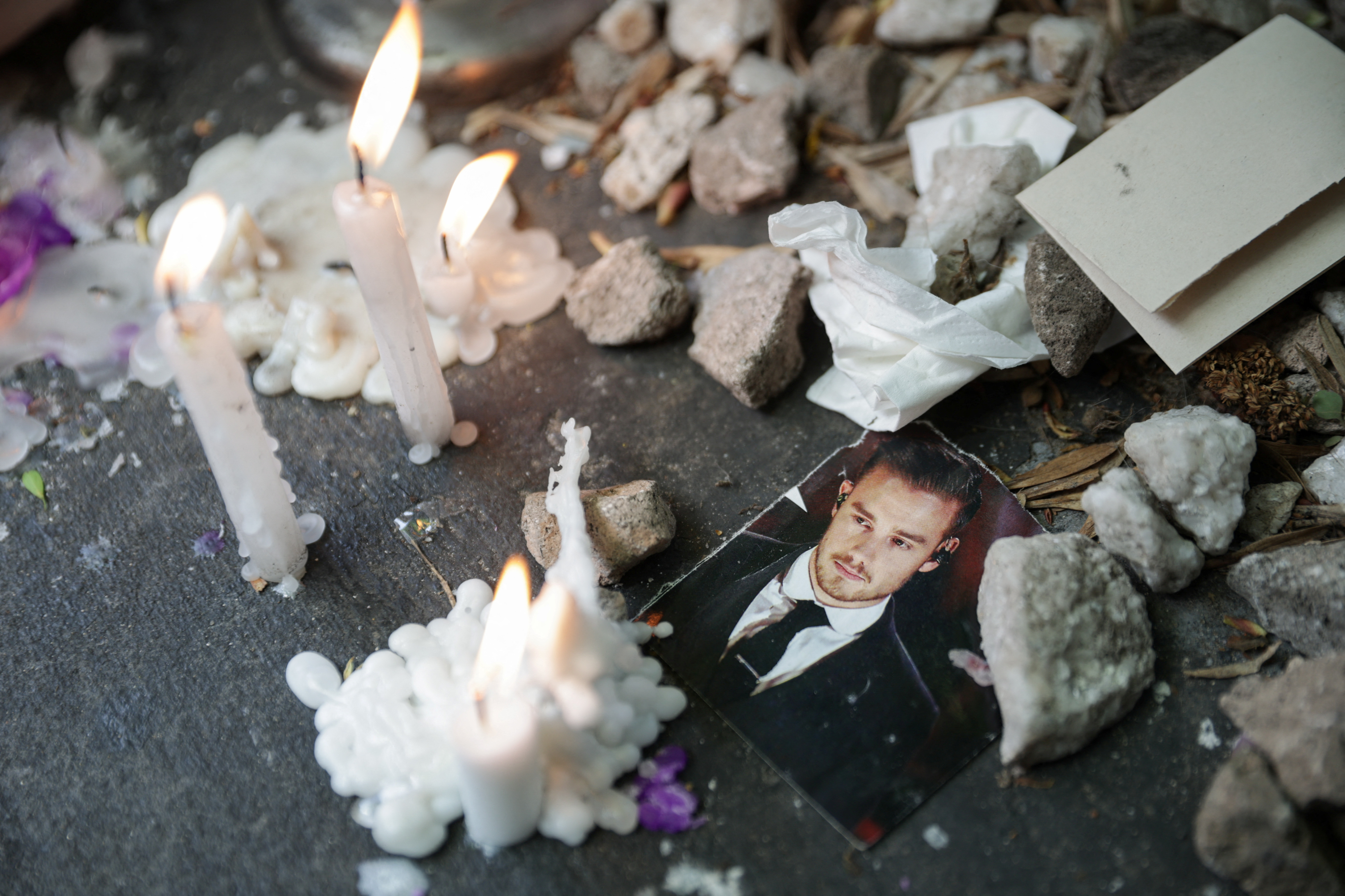 People gather outside the hotel where Liam Payne was found dead, in Buenos Aires