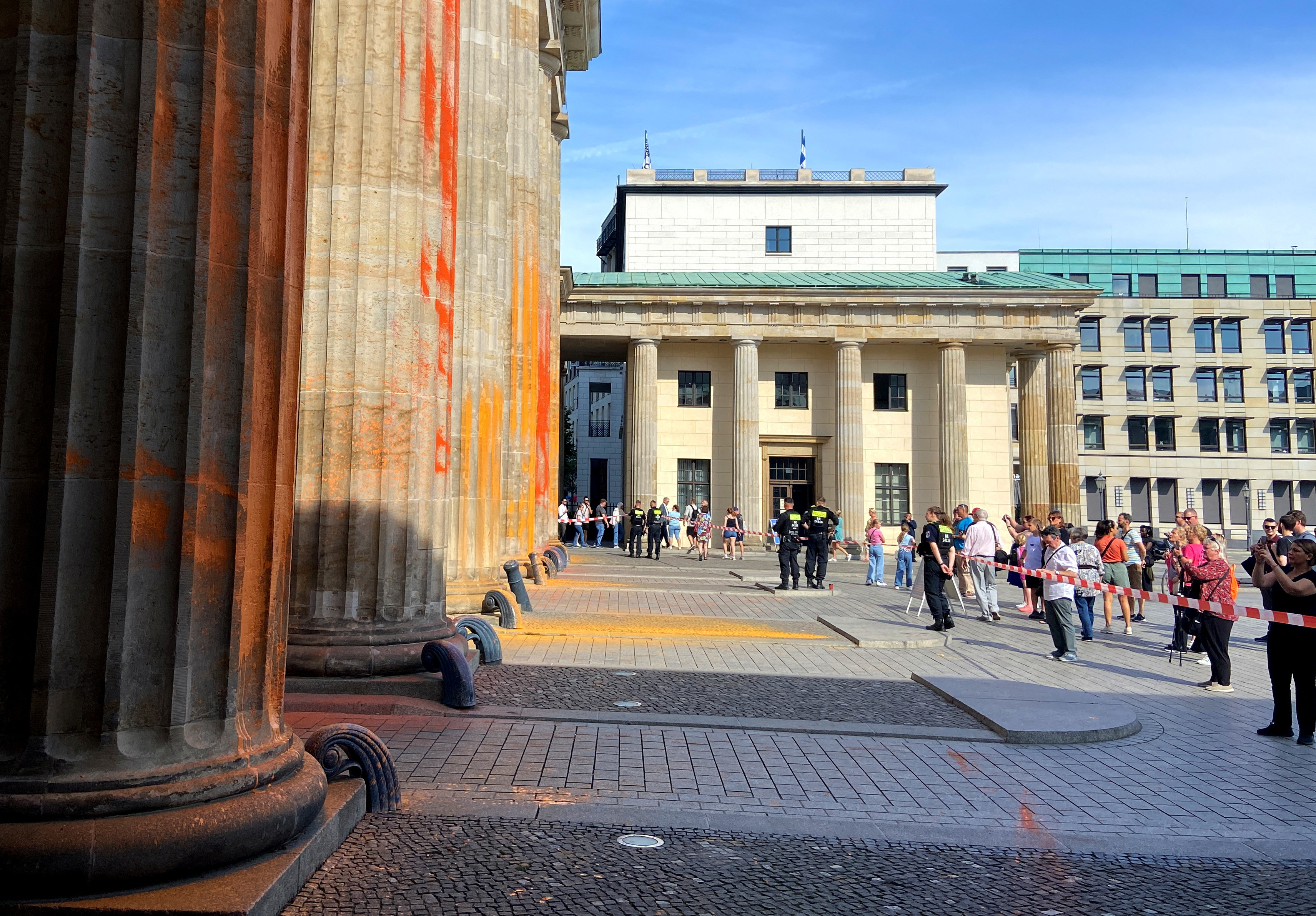 Berlin s Brandenburg Gate spray painted by climate activists Reuters