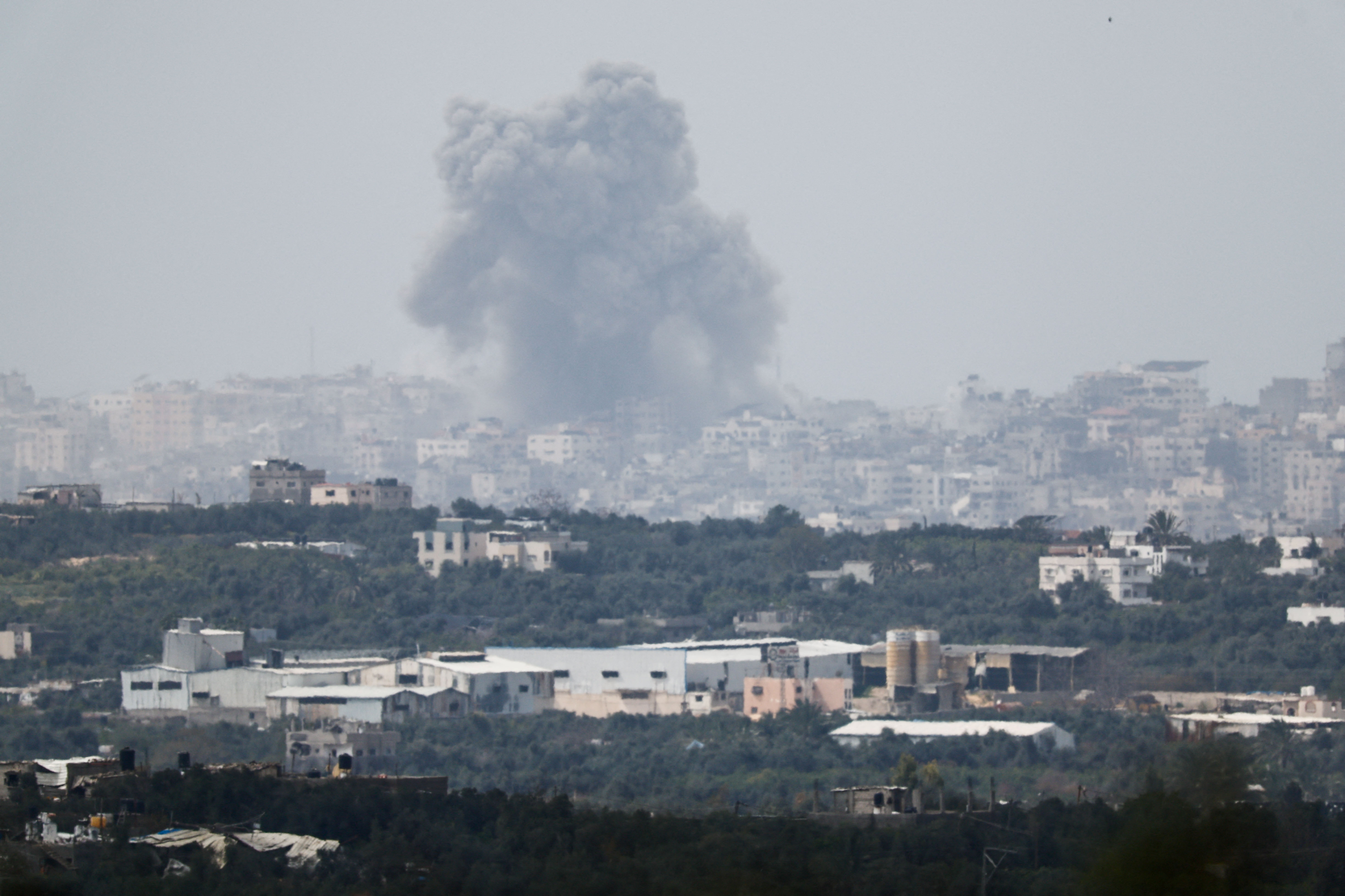 Smoke rises after an explosion in Gaza, as seen from southern Israel