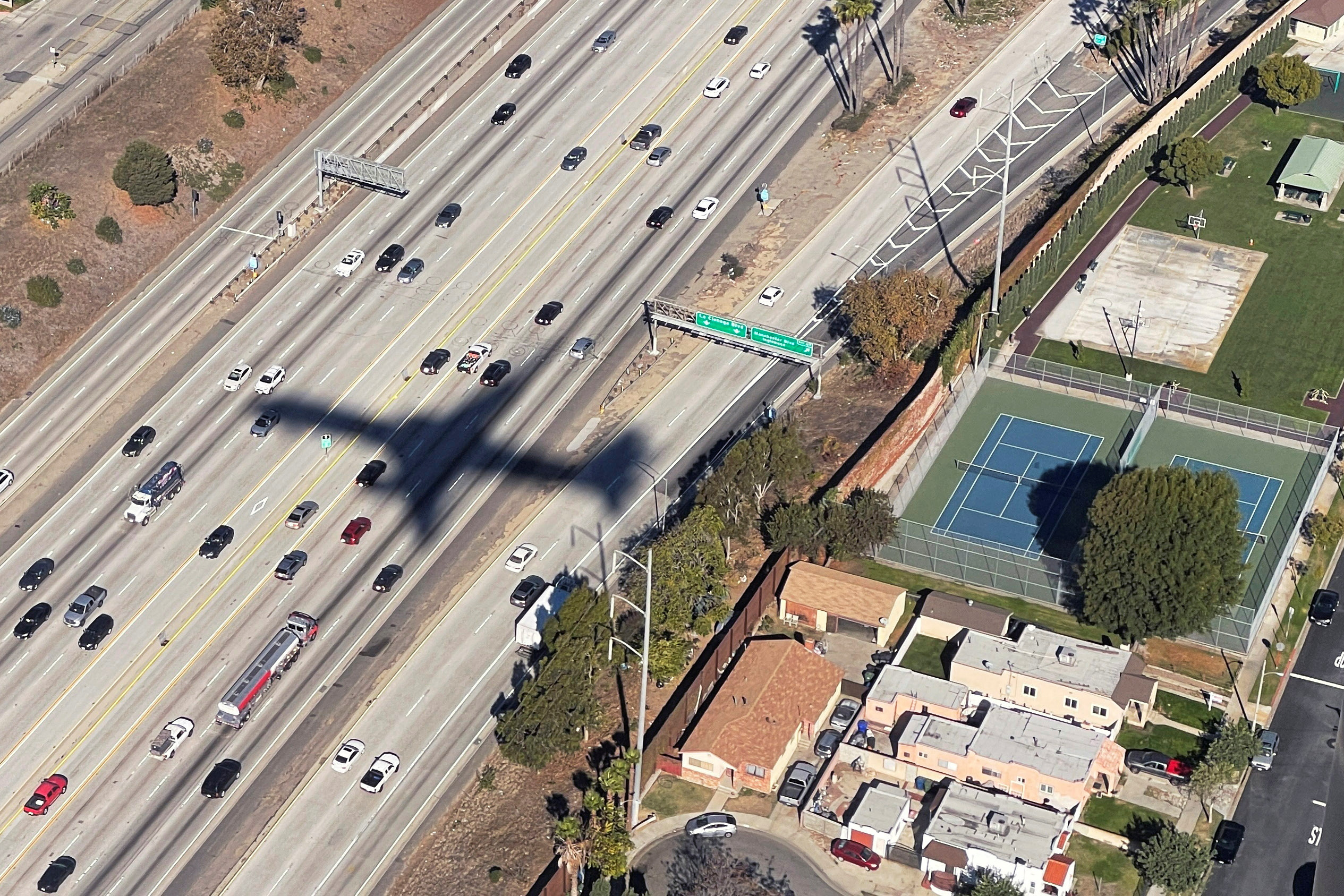 A Delta Airlines flight casts a shadow in Los Angeles