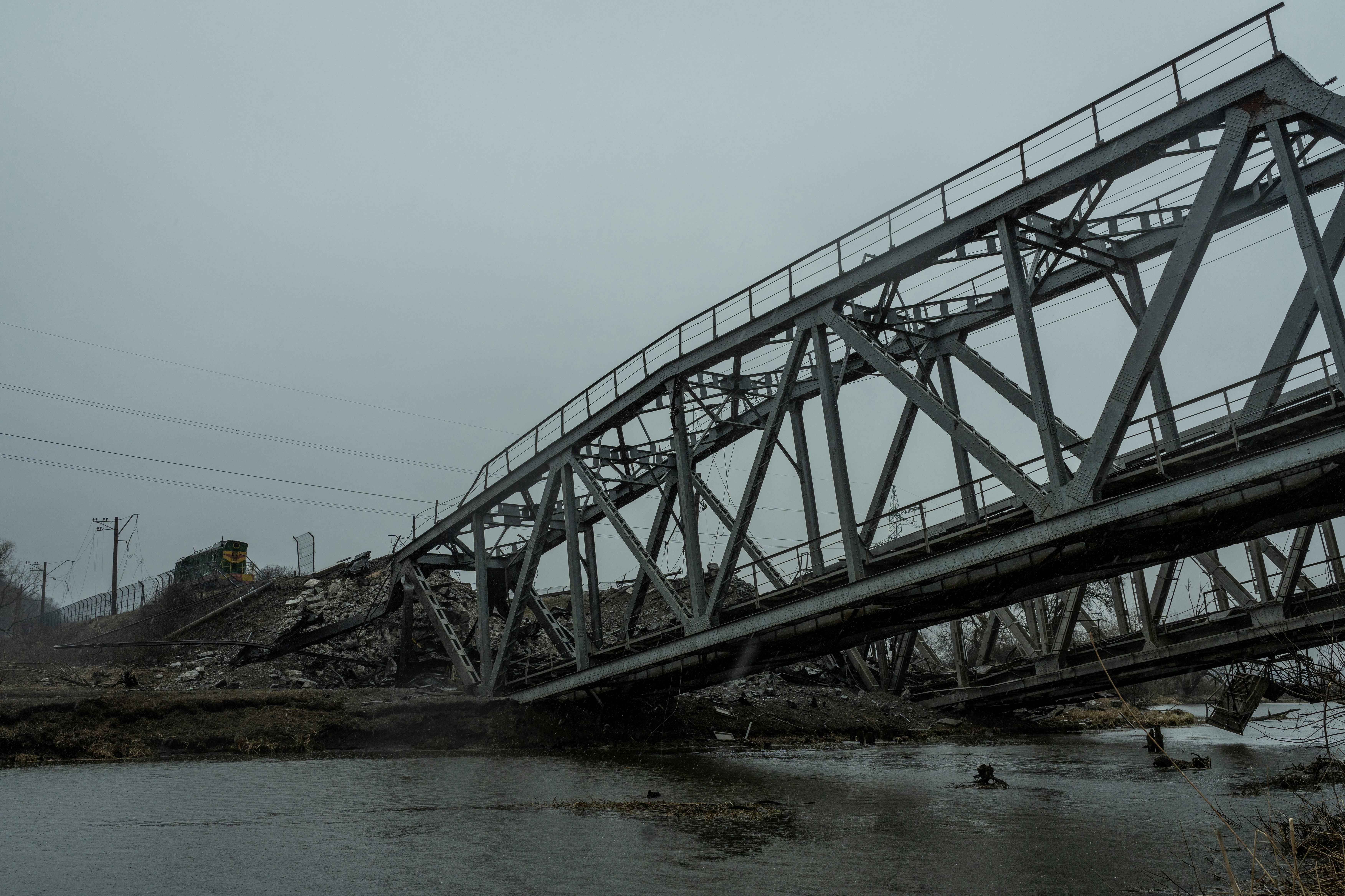 A view shows a railway bridge over the Irpin river destroyed by heavy shelling in Irpin