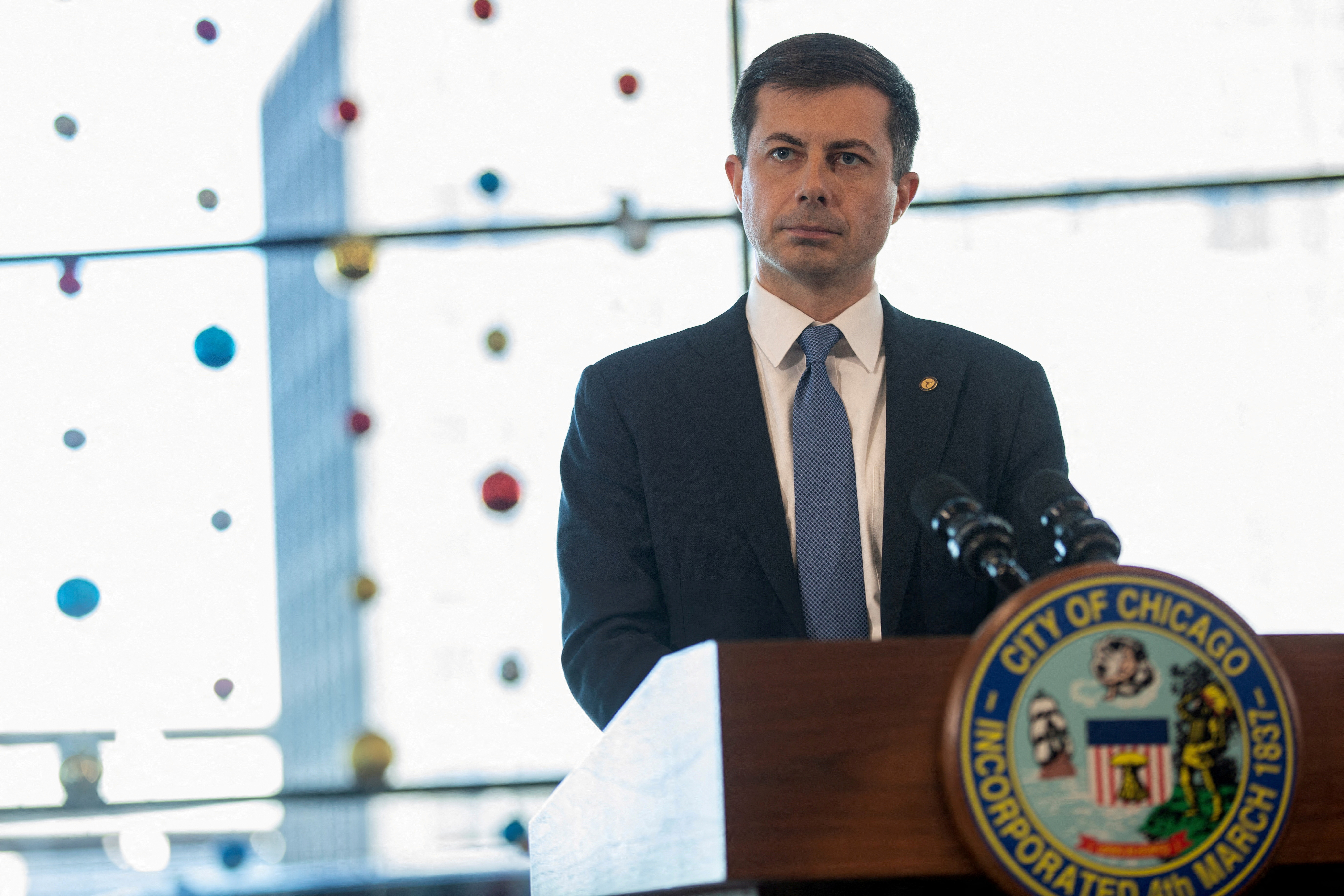 U.S. Transportation Secretary Pete Buttigieg speaks at O'Hare airport in Chicago