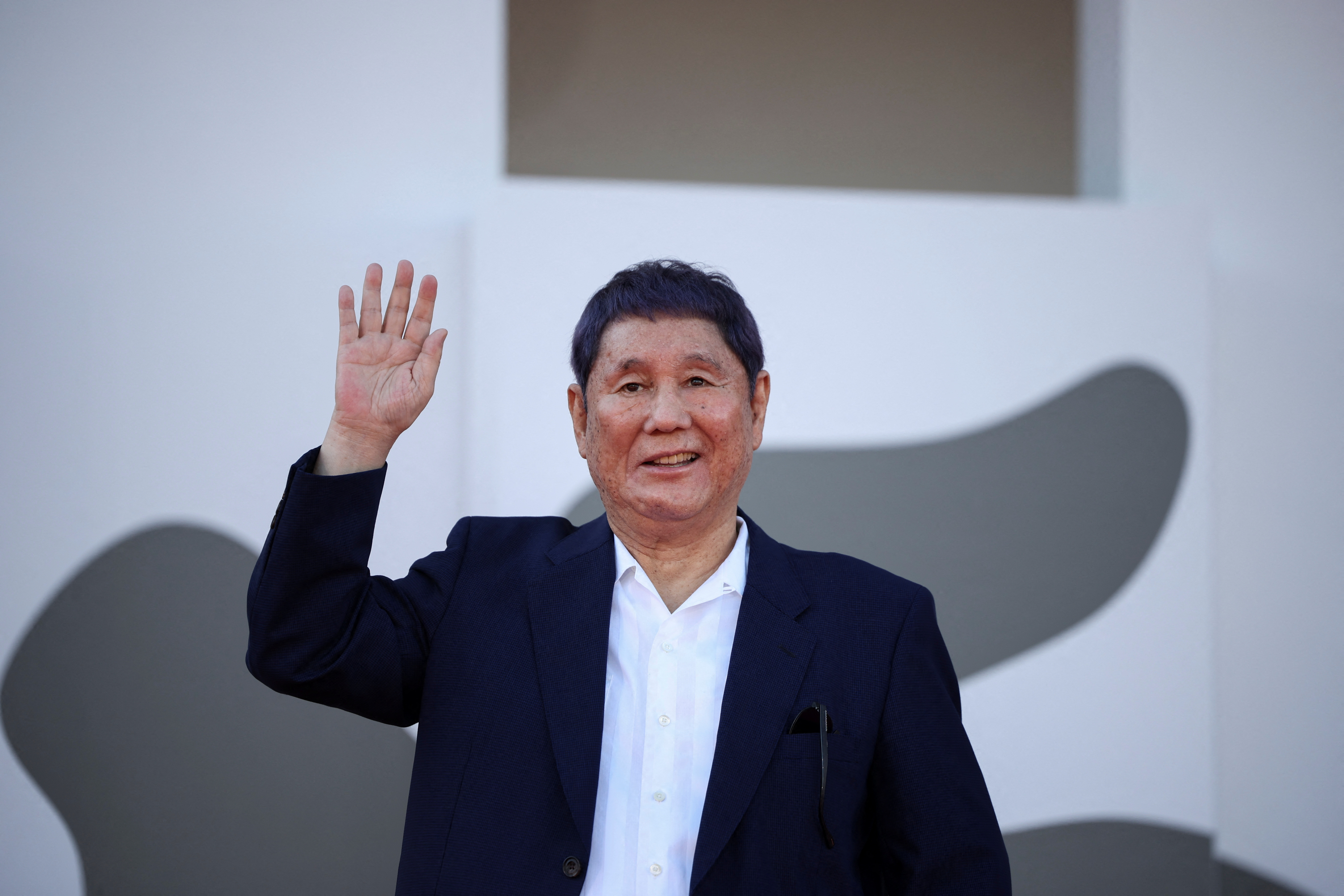 Japan's Takeshi Kitano 'a bit embarrassed' as new film shows at
