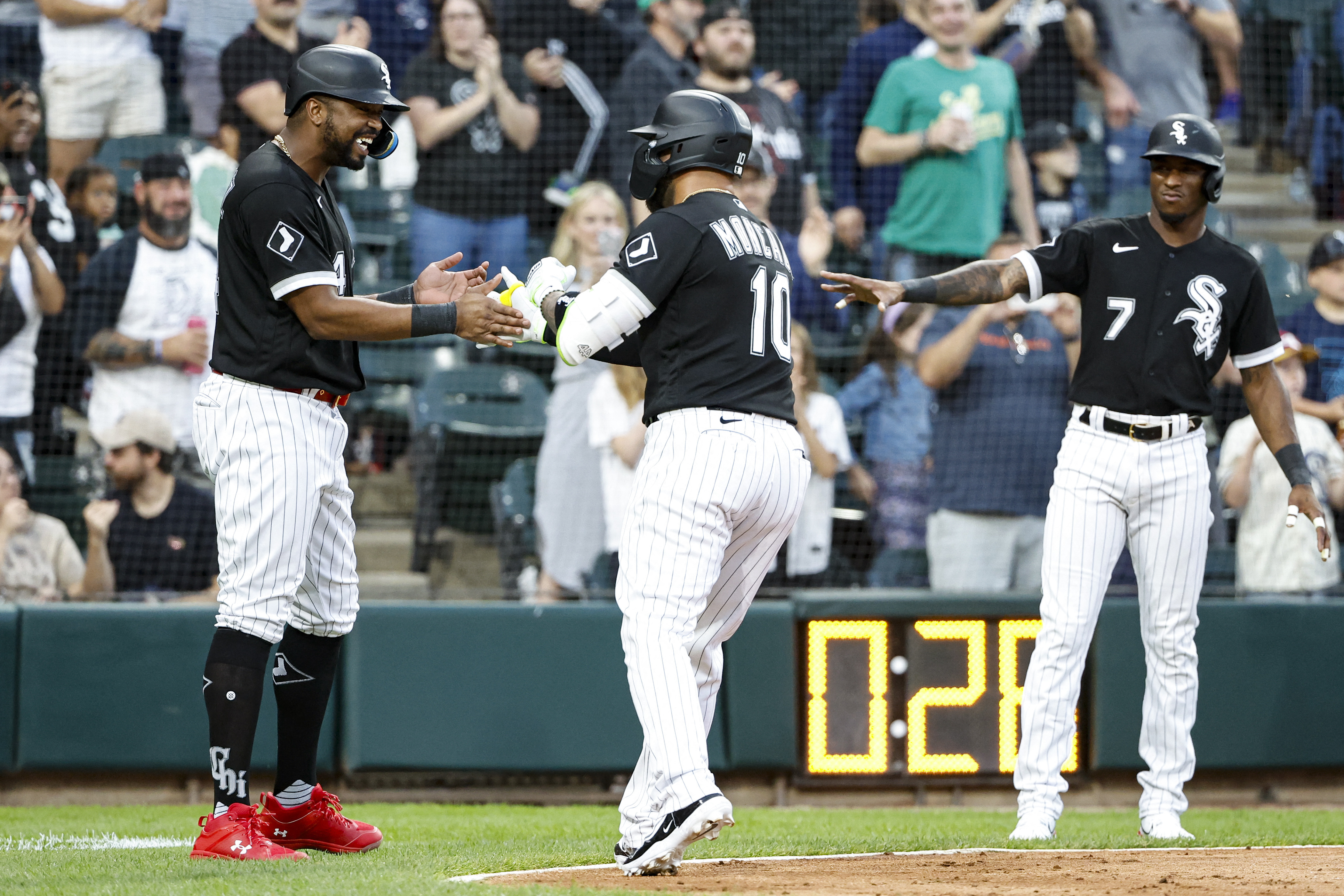 Chicago White Sox pinch hitter Carlos Pérez (36) celebrates his two-RBI  double against the Oakland Athletics during the eighth inning of a baseball  game, Saturday, July 1, 2023, in Oakland, Calif. (AP