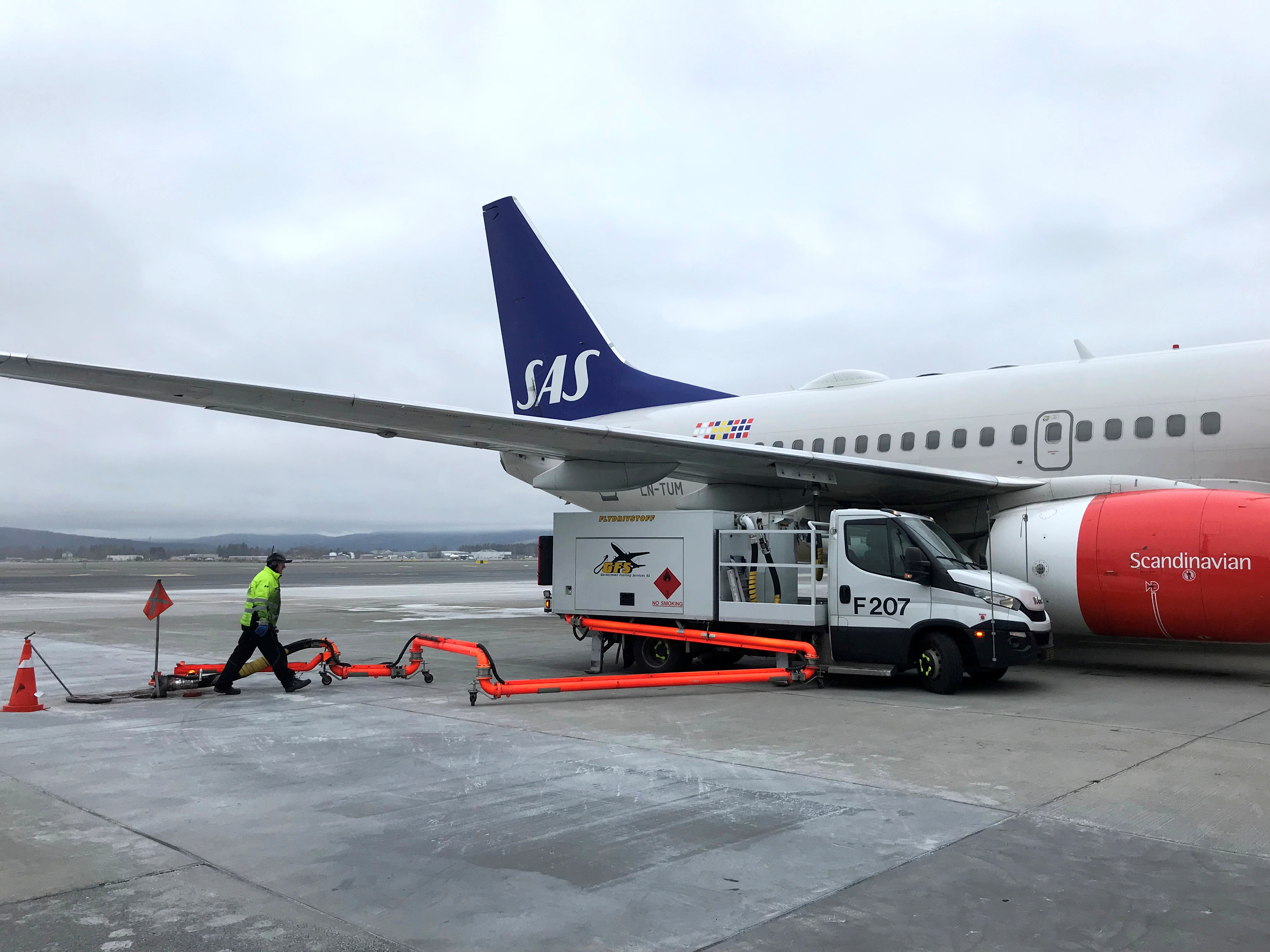 A Scandinavian Airlines (SAS) plane is refuelled at Oslo Gardermoen airport