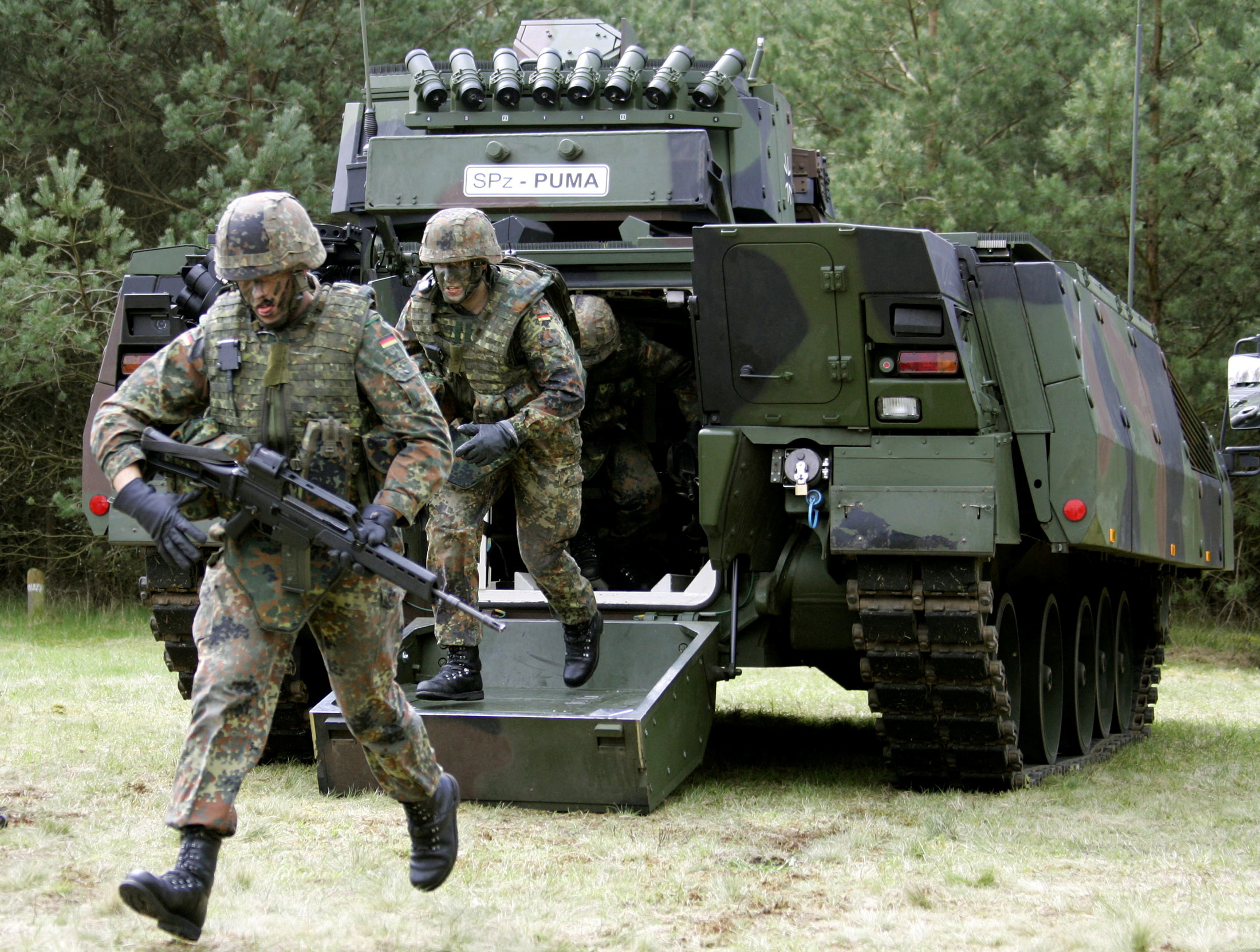 Soldiers conduct an exercise with the new German Armoured Infantry Fighting Vehicle AIFV Puma for th..