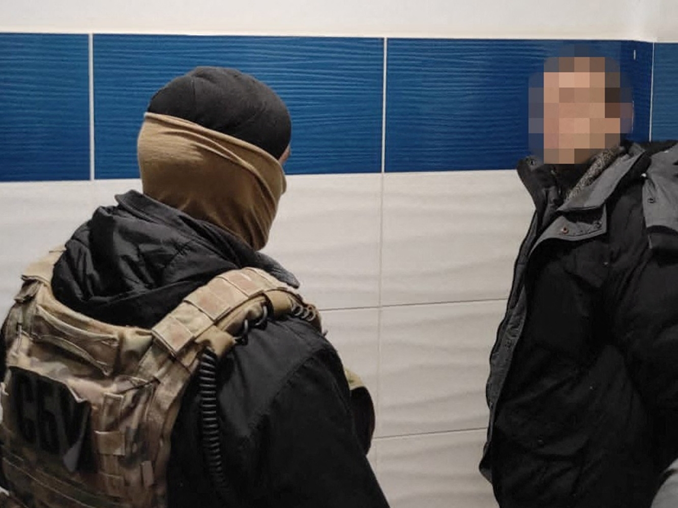 A man who, according to the State Security Service of Ukraine, is a Russian military intelligence agent, is detained in an unknown location