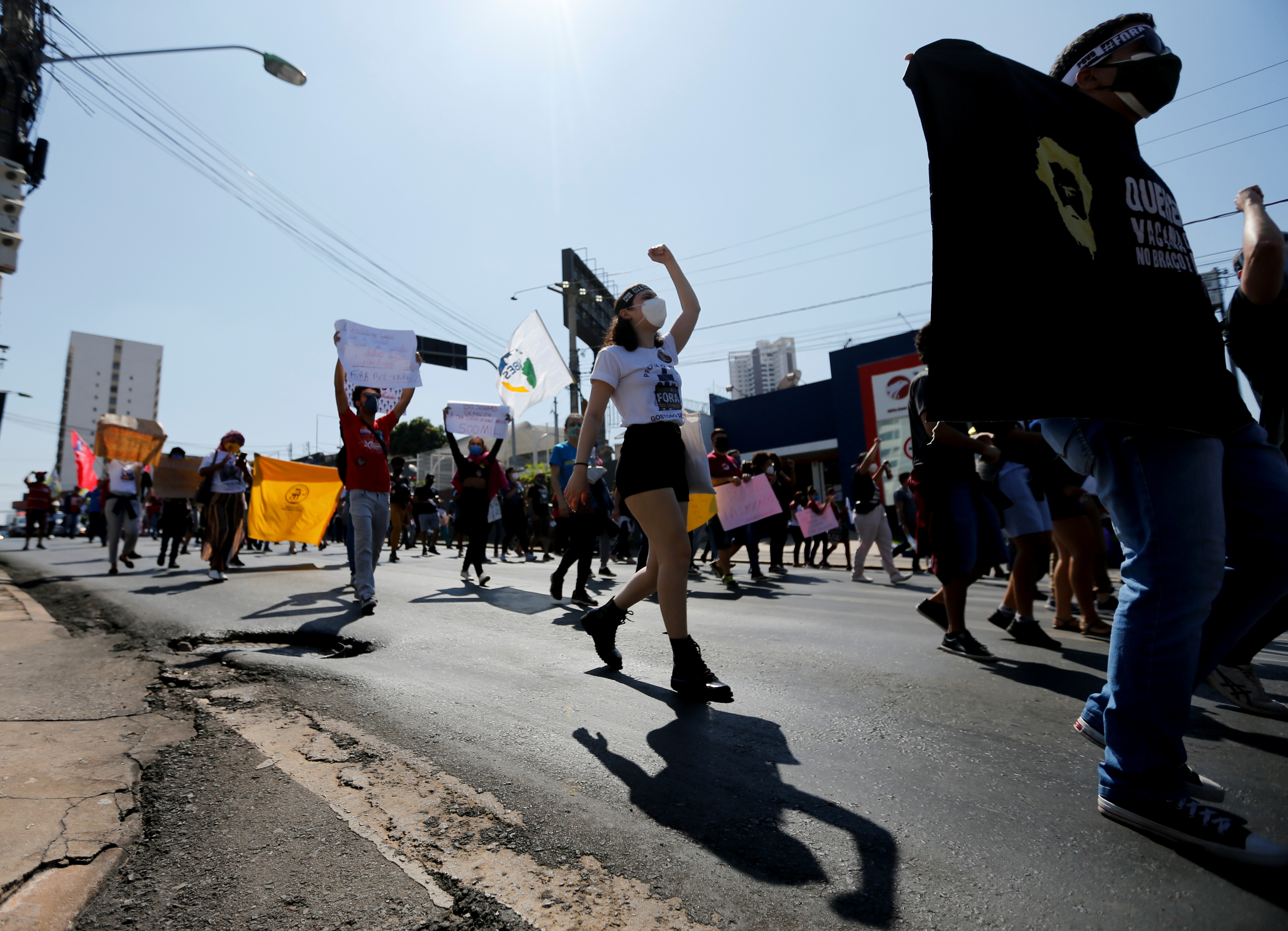People participate in a protest against Brazil's President Jair Bolsonaro and his handling of the coronavirus disease (COVID-19) pandemic in Cuiaba, Brazil, June 19, 2021. REUTERS/Mariana Greif