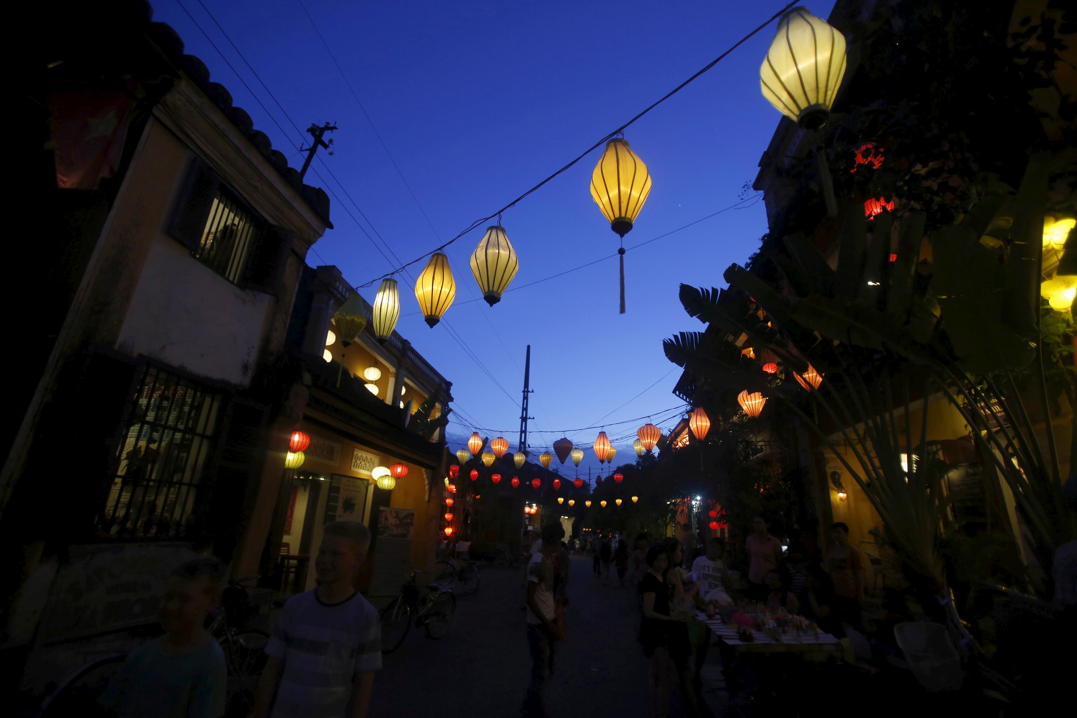 Lanterns hang on a street in Vietnam's central ancient town of Hoi An, a UNESCO heritage site