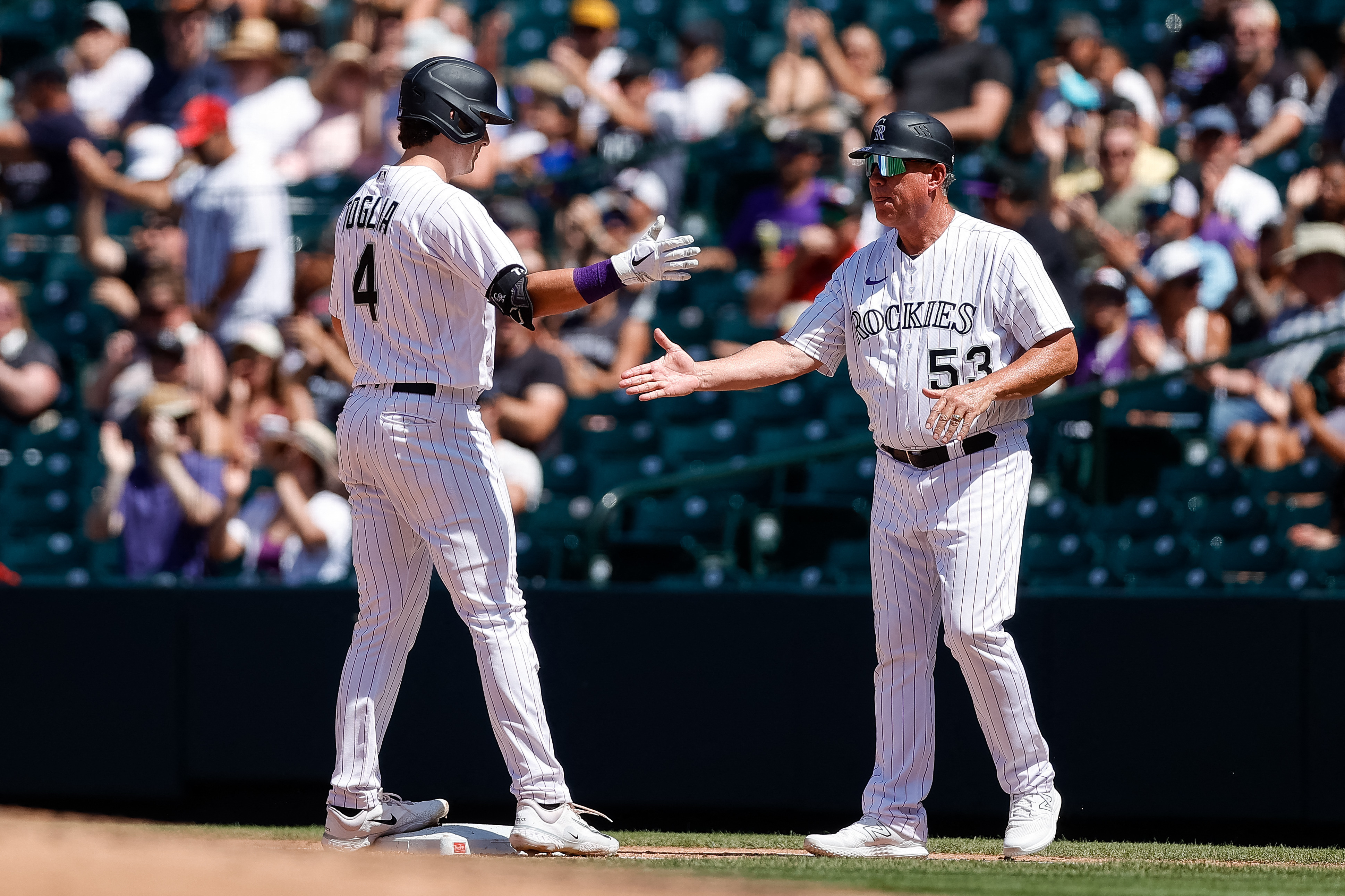 Chicago White Sox third baseman Yoan Moncada (10) swings at the pitch in an  MLB baseball game against the Colorado Rockies, Sunday, Aug. 20, 2023. The  White Sox defeated the Rockies 10-5