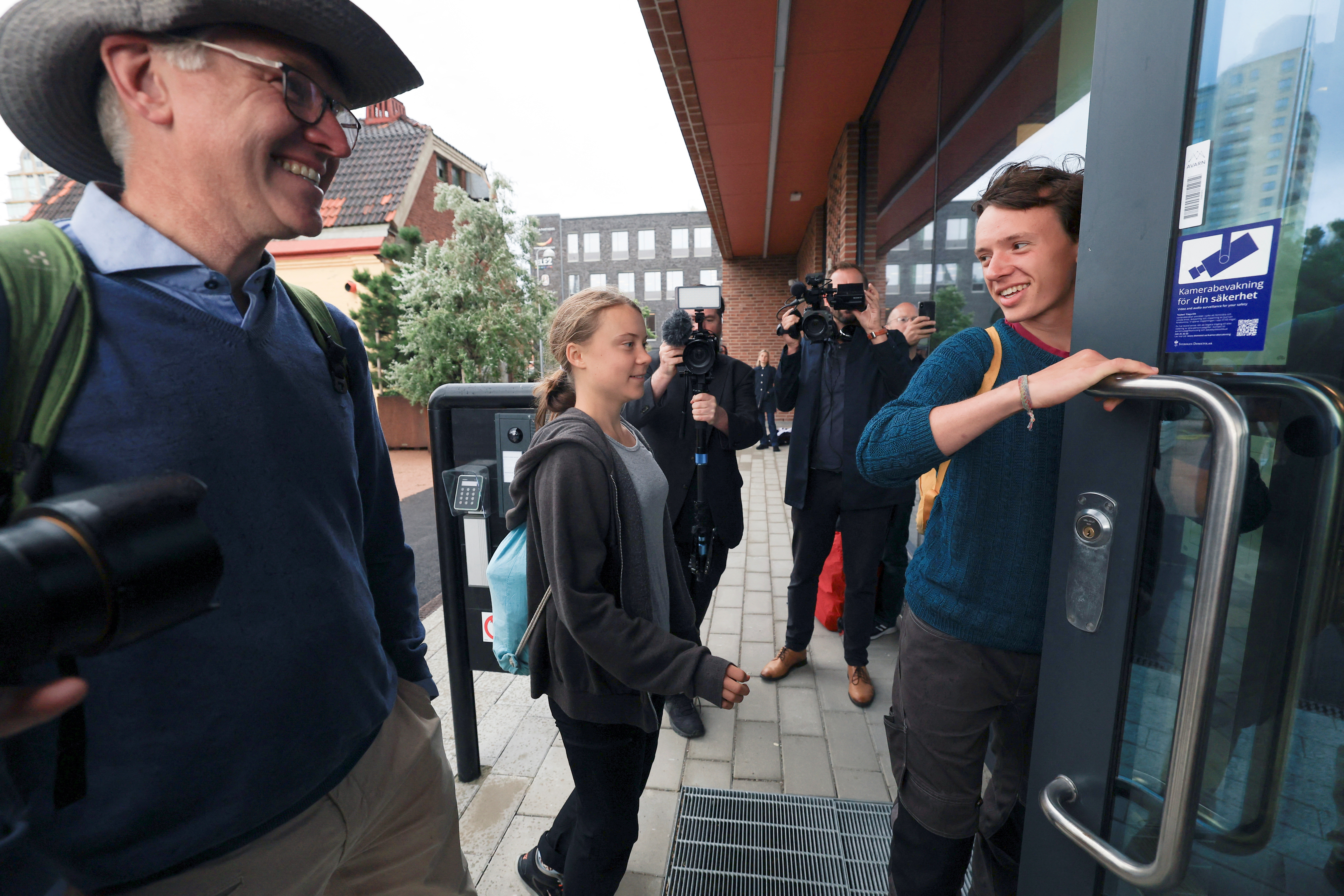 Greta Thunberg forcibly removed from protest hours after conviction for  similar action in June | Reuters