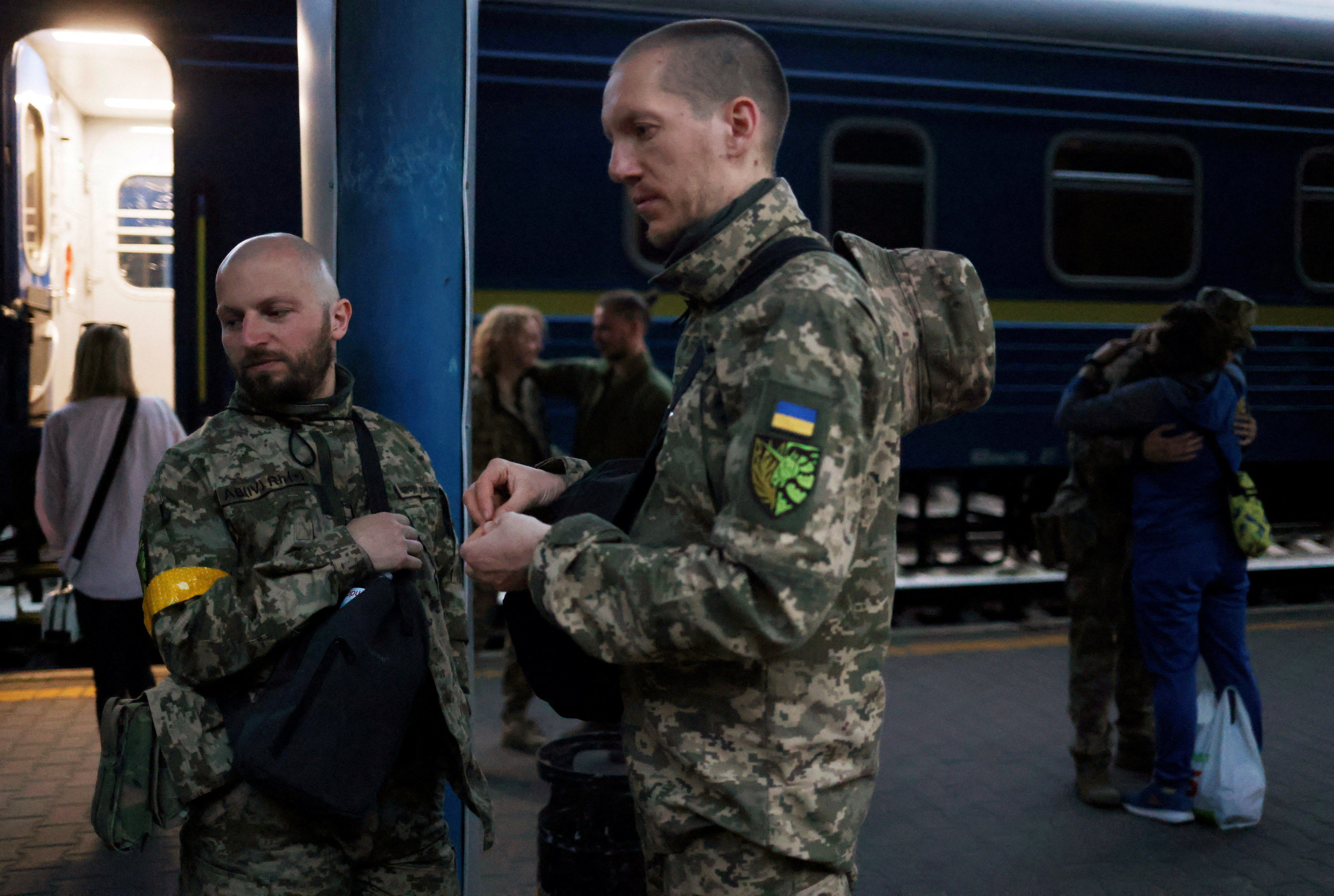 Couple leave for the frontline to serve the Territorial Defence army, in Kyiv