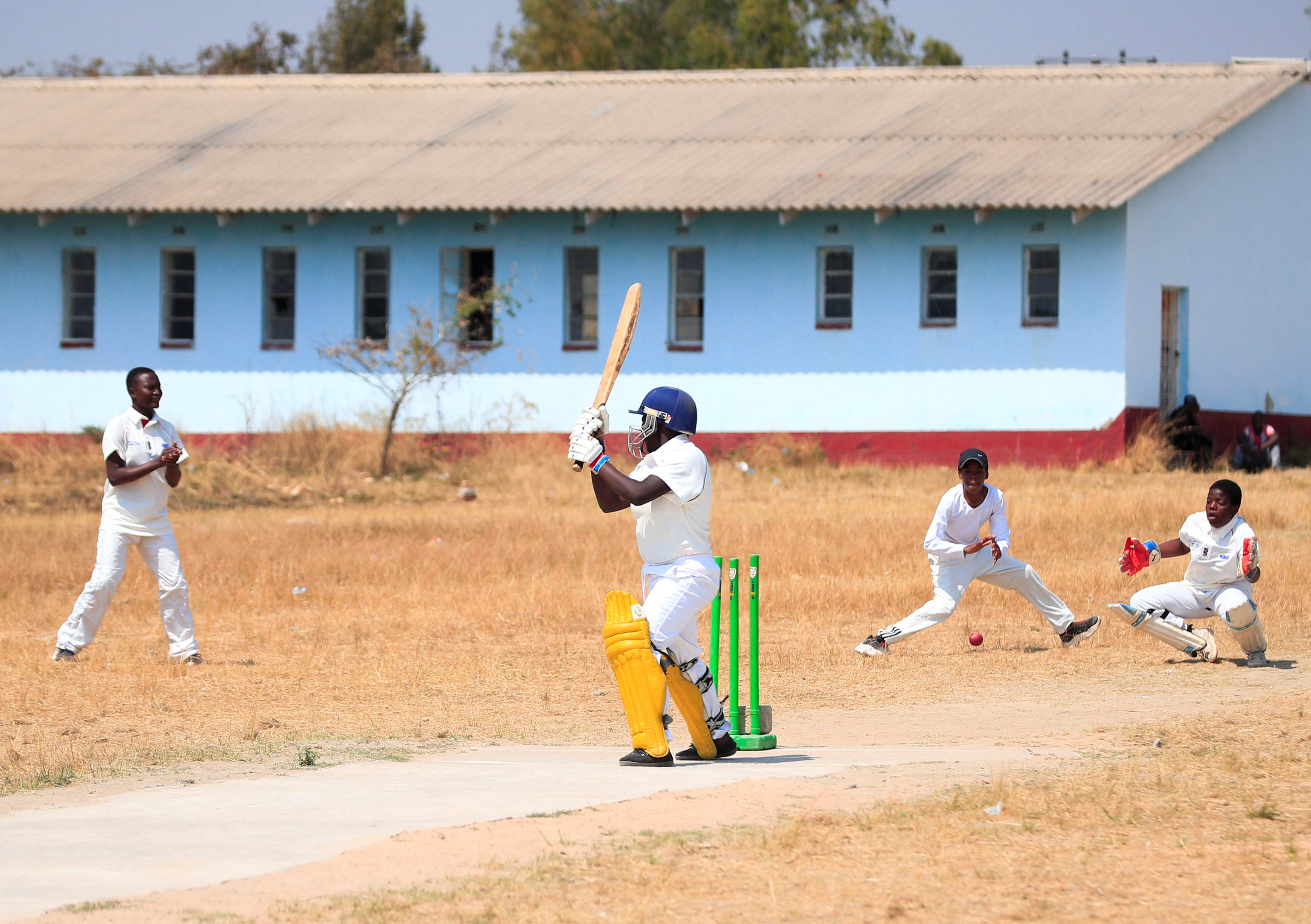 Girls play cricket during a practice match at Munyawiri Secondary School in rural Domboshava