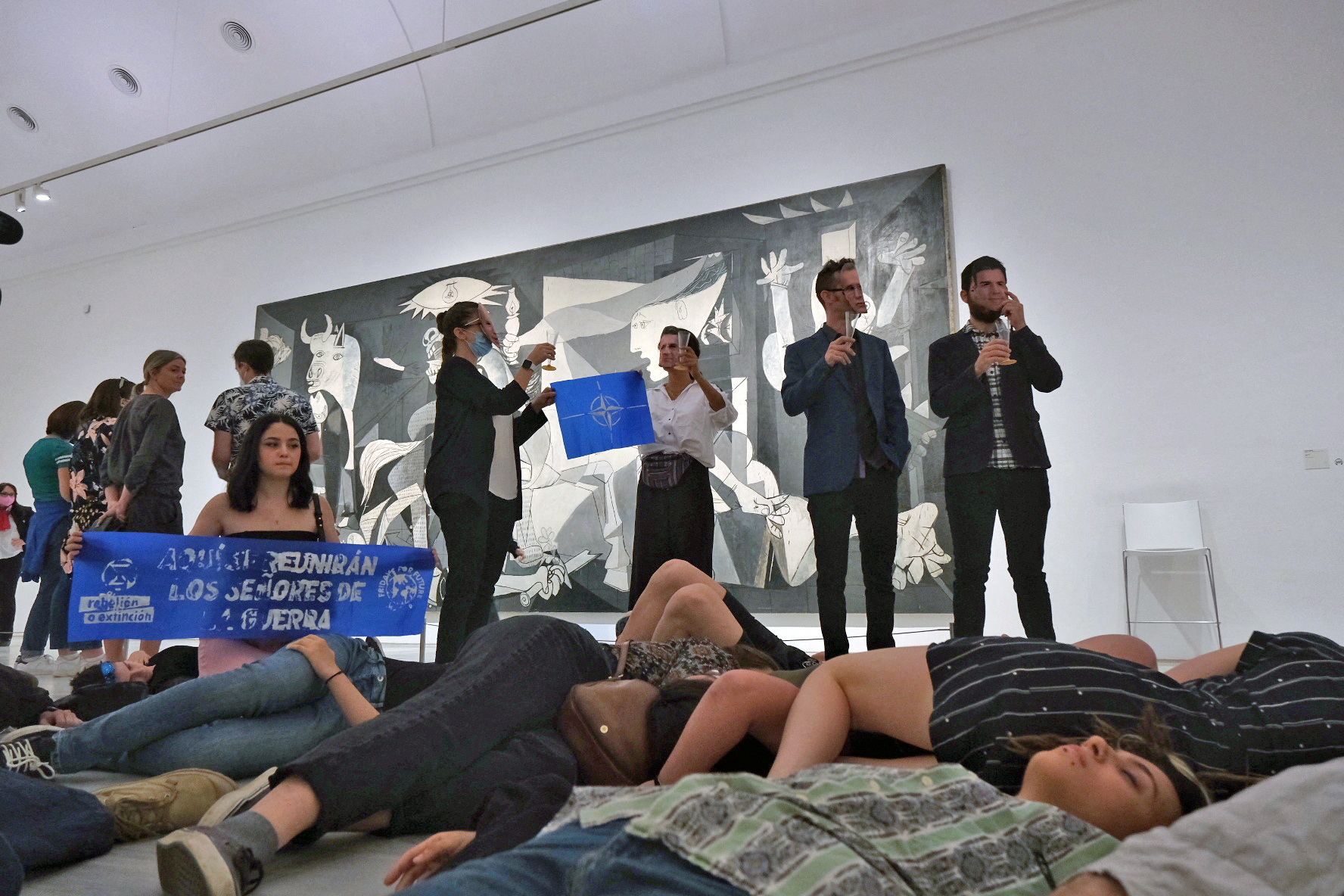Extinction Rebellion stage a protest at famous Guernica painting at Reina Sofia museum