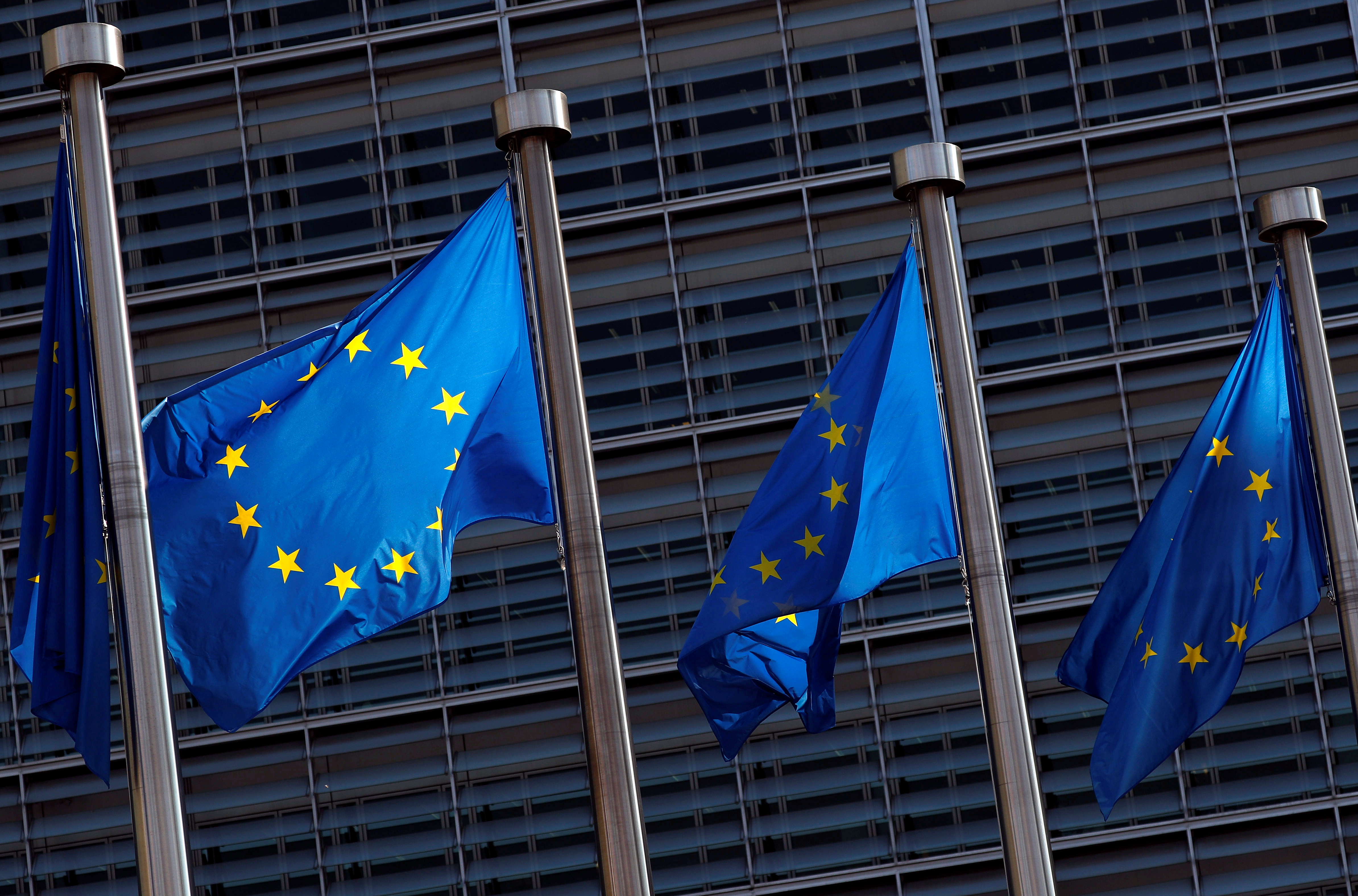 EU flags are seen outside the EU Commission headquarters in Brussels