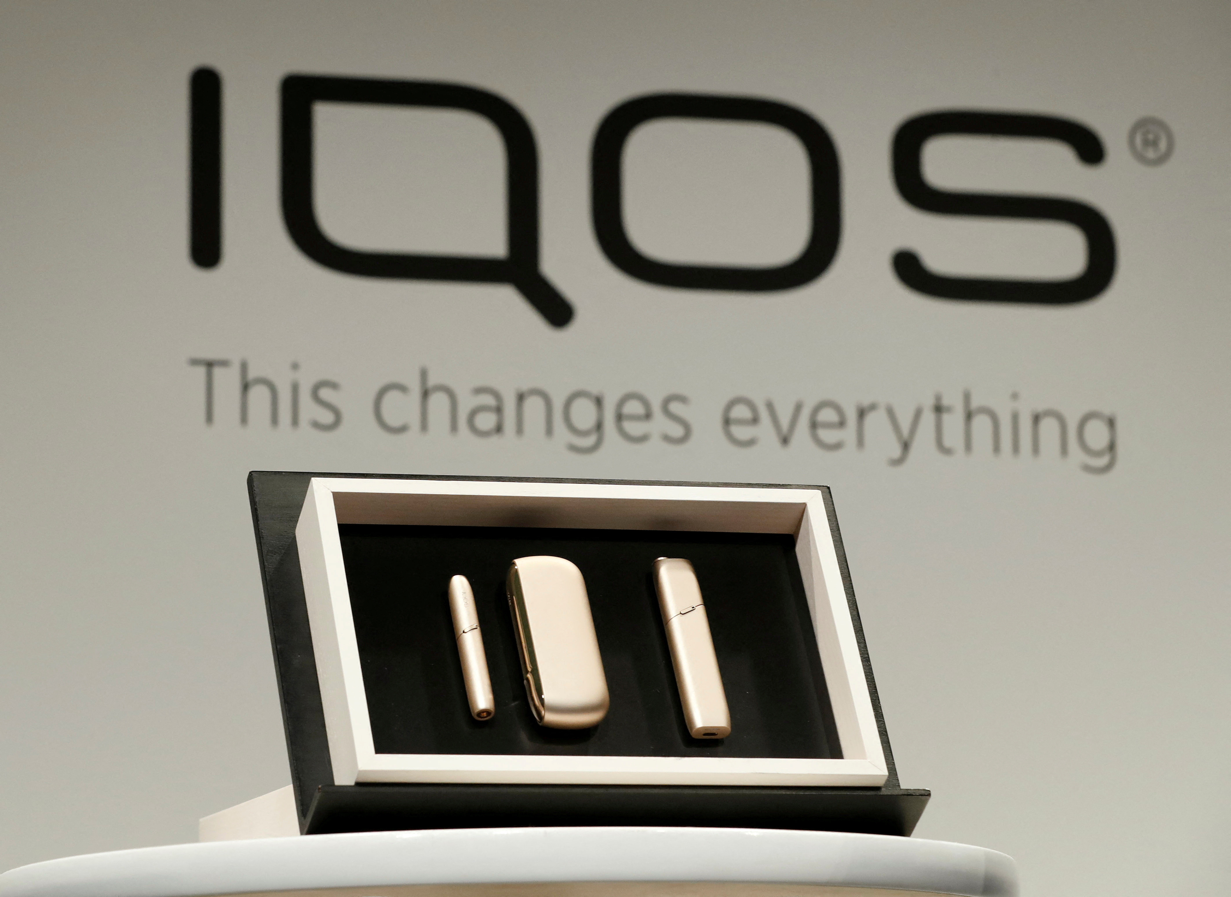 Philip Morris new IQOS 3 devices are displayed during a news conference by its International's CEO Andre Calantzopoulos in Tokyo