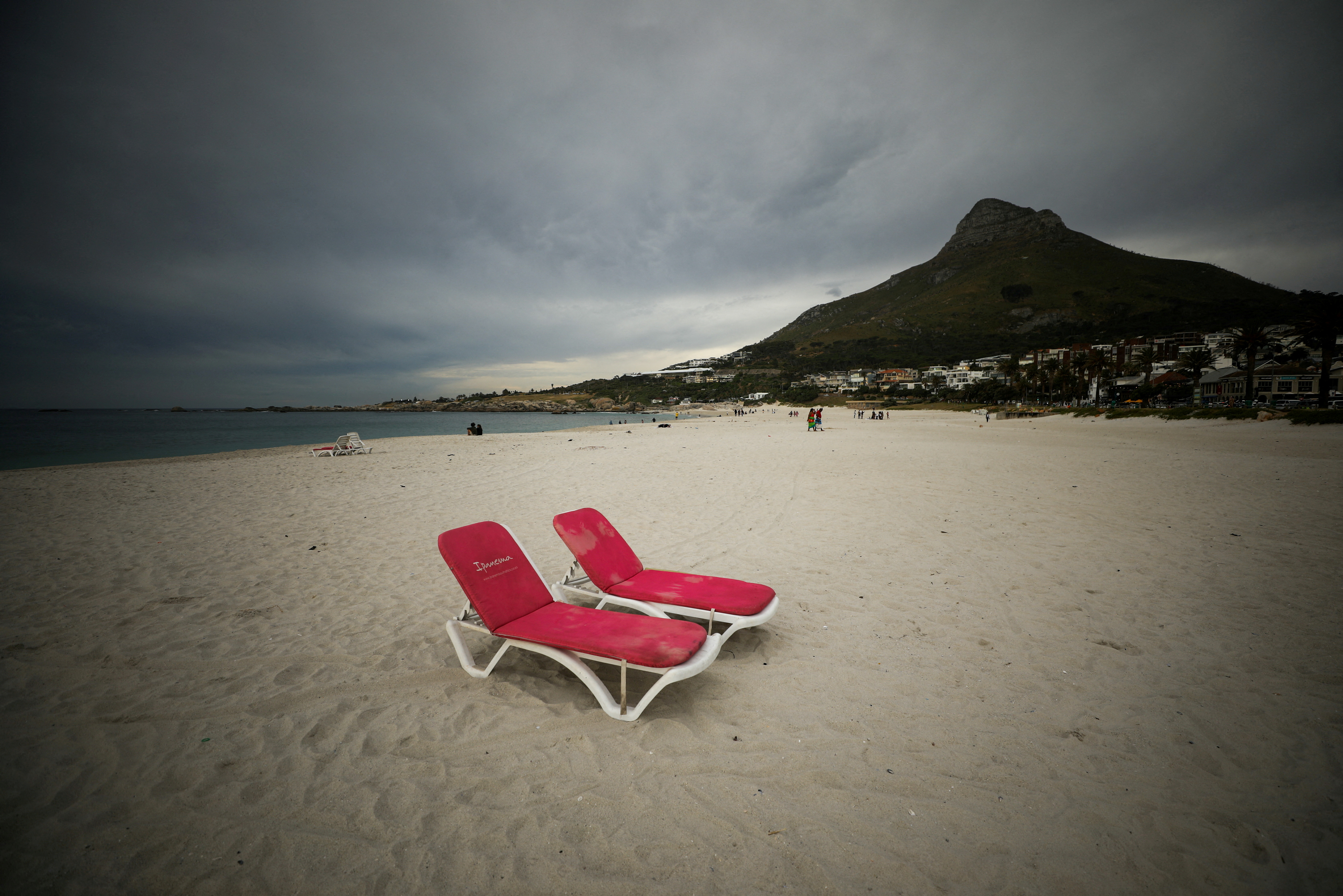 Empty recliners are seen at the popular Camps Bay Beach as numbers of international tourists decline in Cape Town
