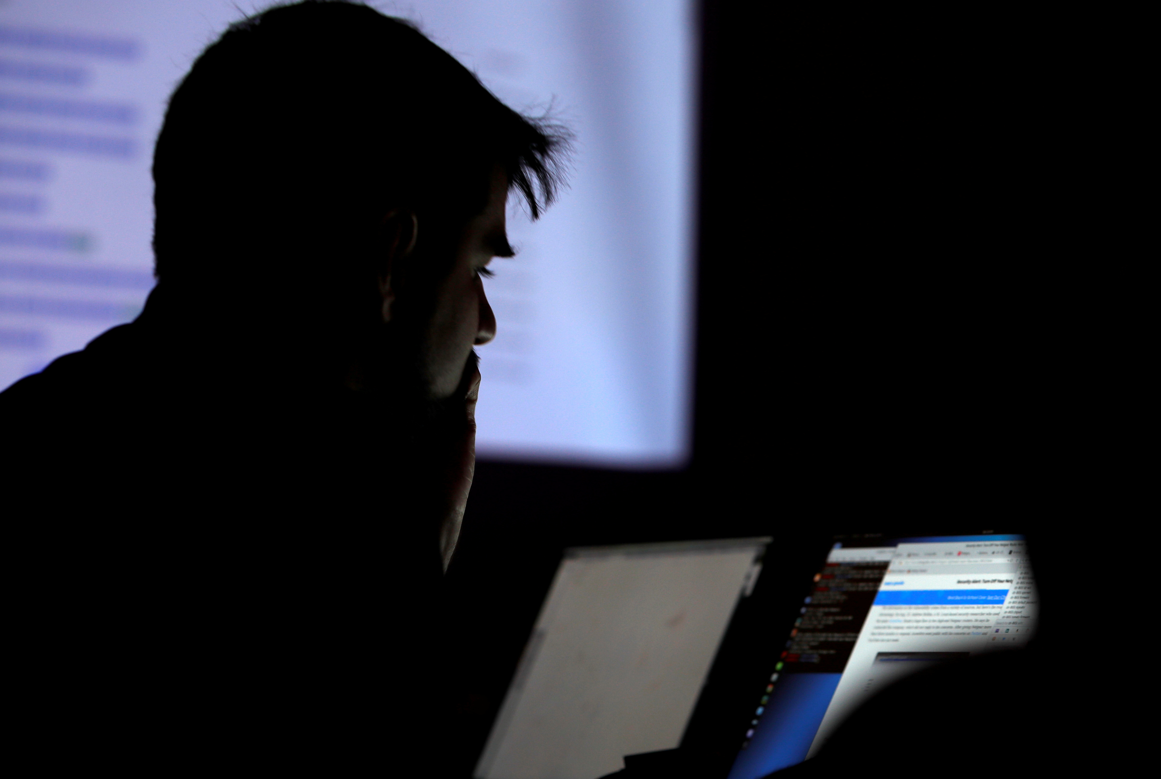 A man takes part in a hacking contest.