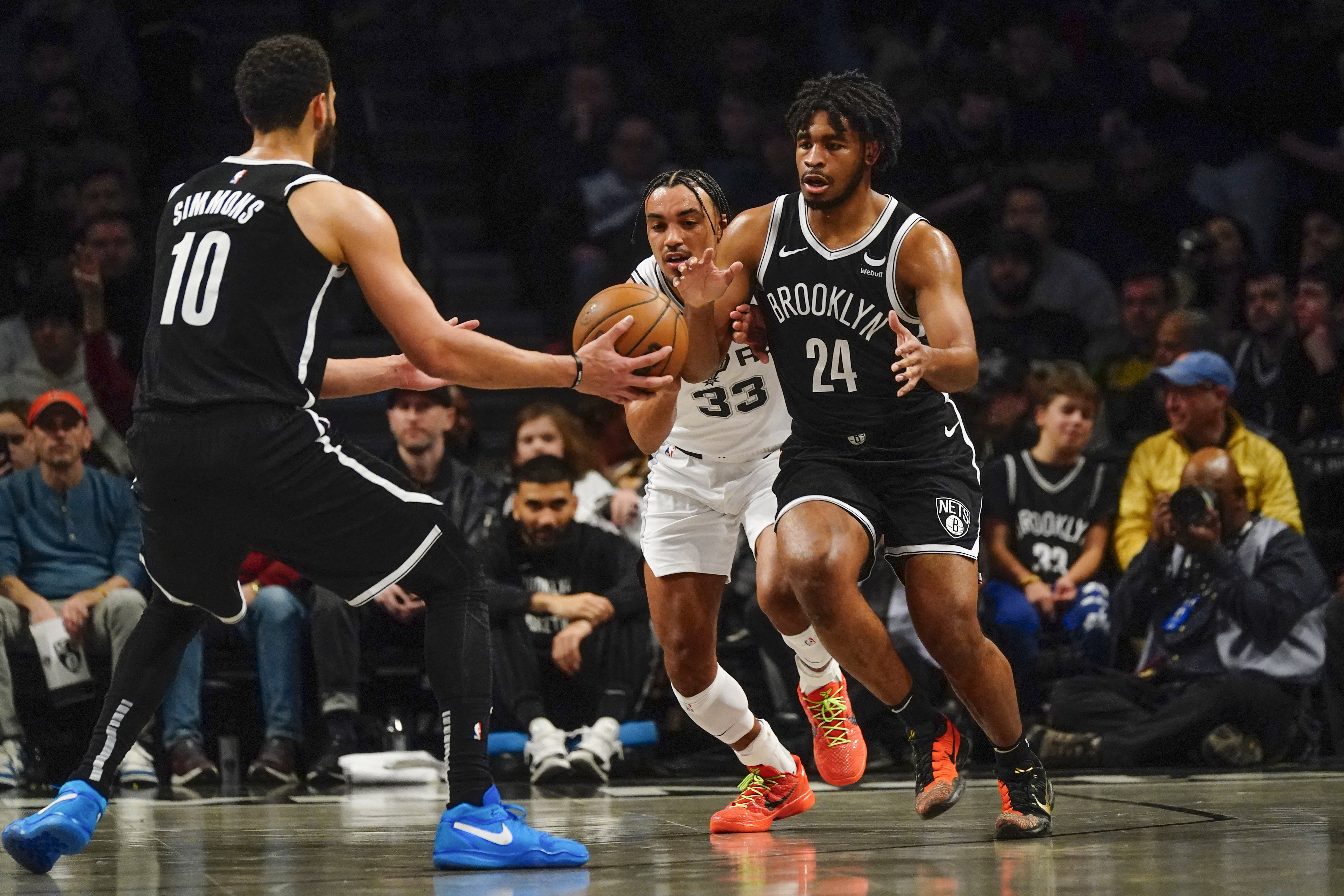 Dennis Schroder's strong debut leads Nets past Spurs