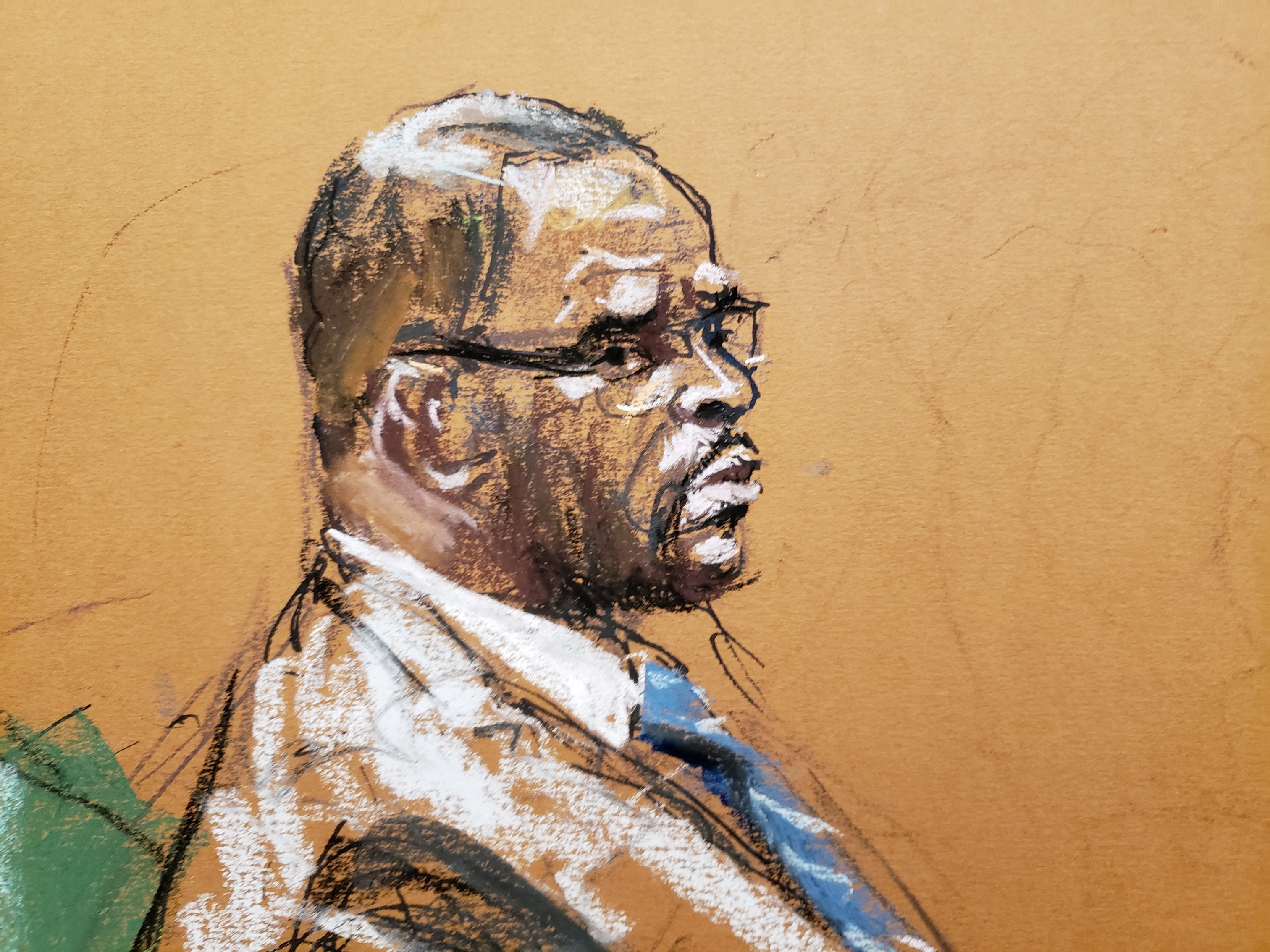 R Kelly attends Brooklyn's Federal District Court during the start of his trial in New York