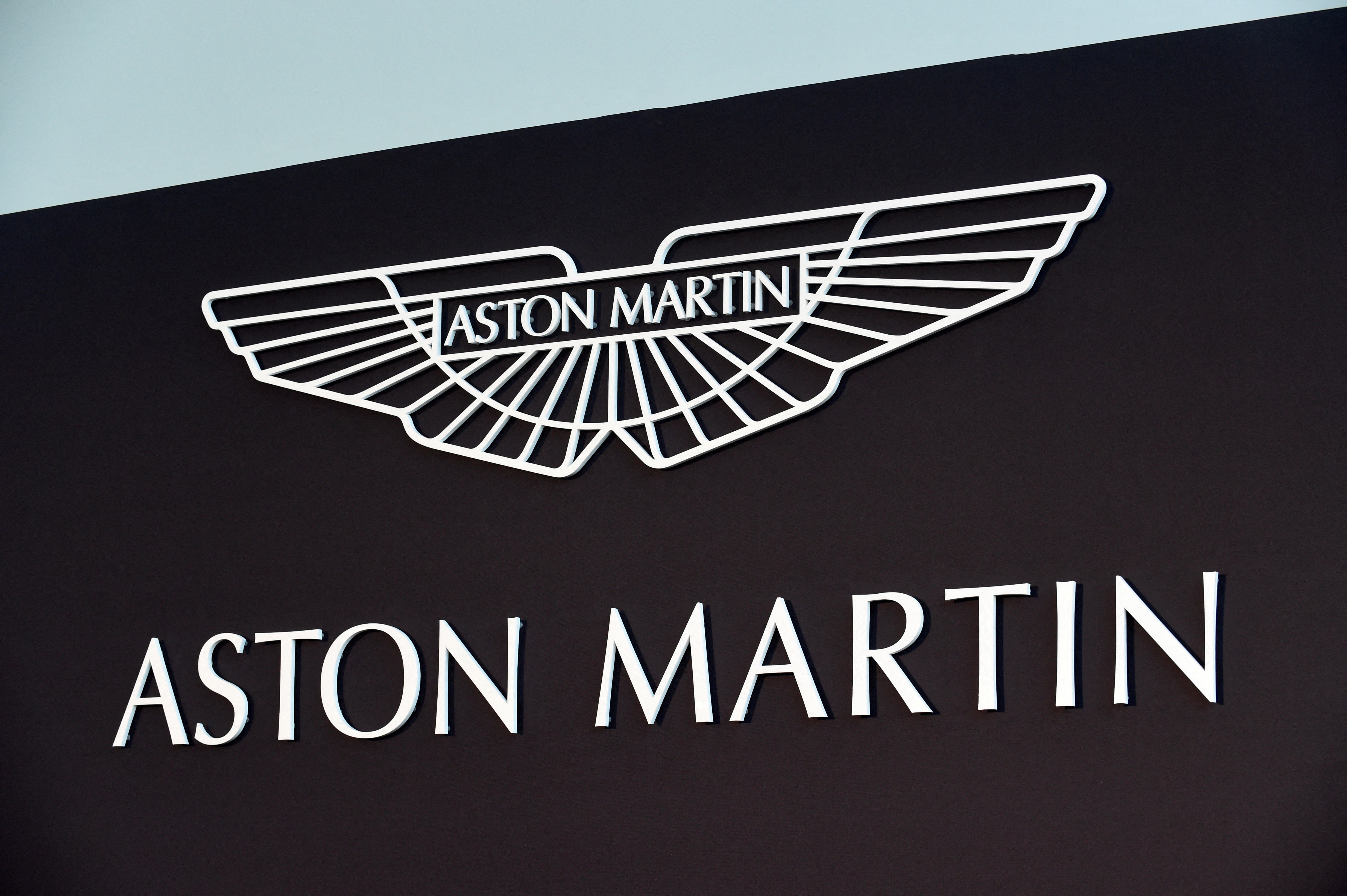 An Aston Martin logo is pictured at the factory in Saint Athan