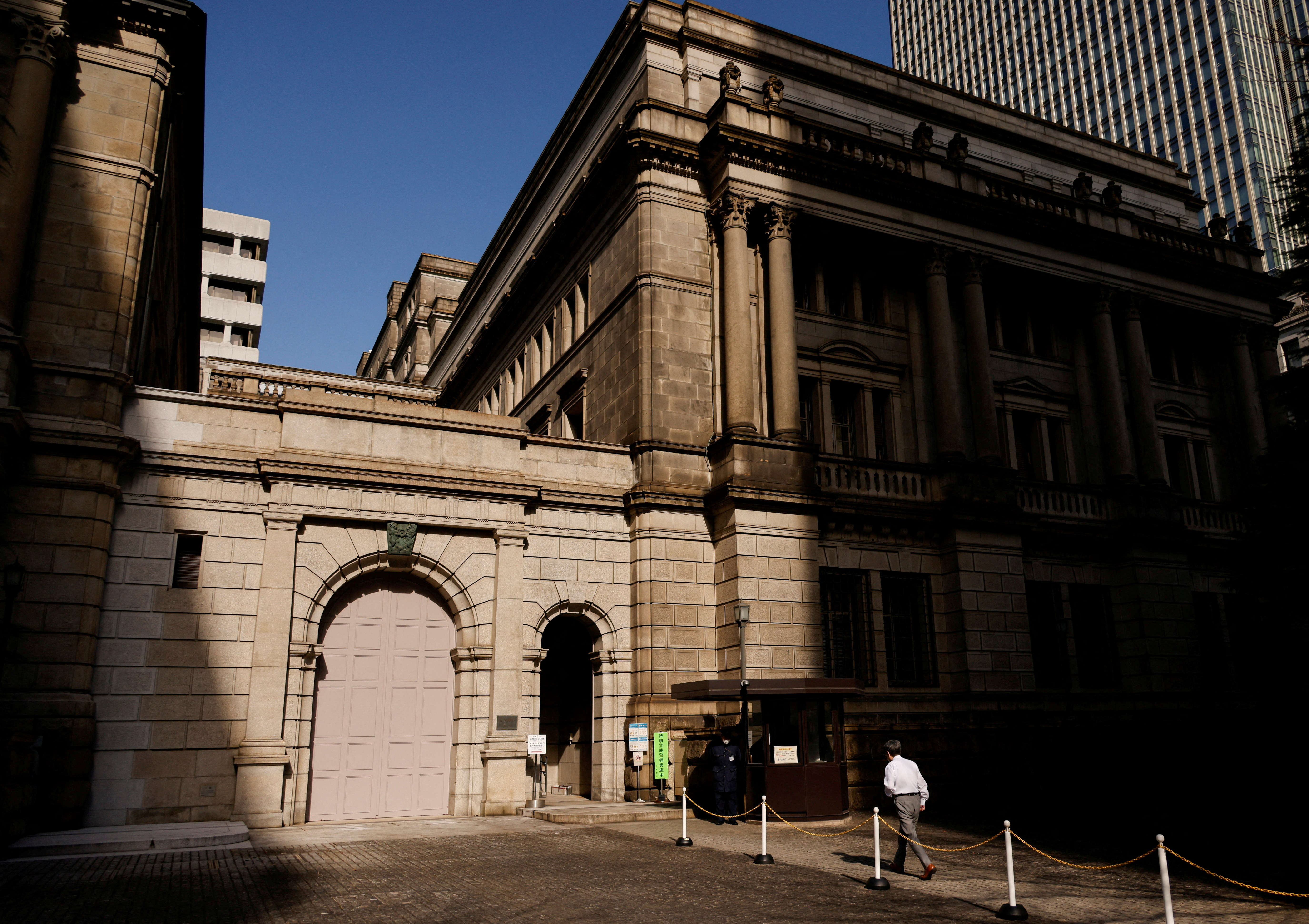 A man walks at the headquarters of Bank of Japan in Tokyo