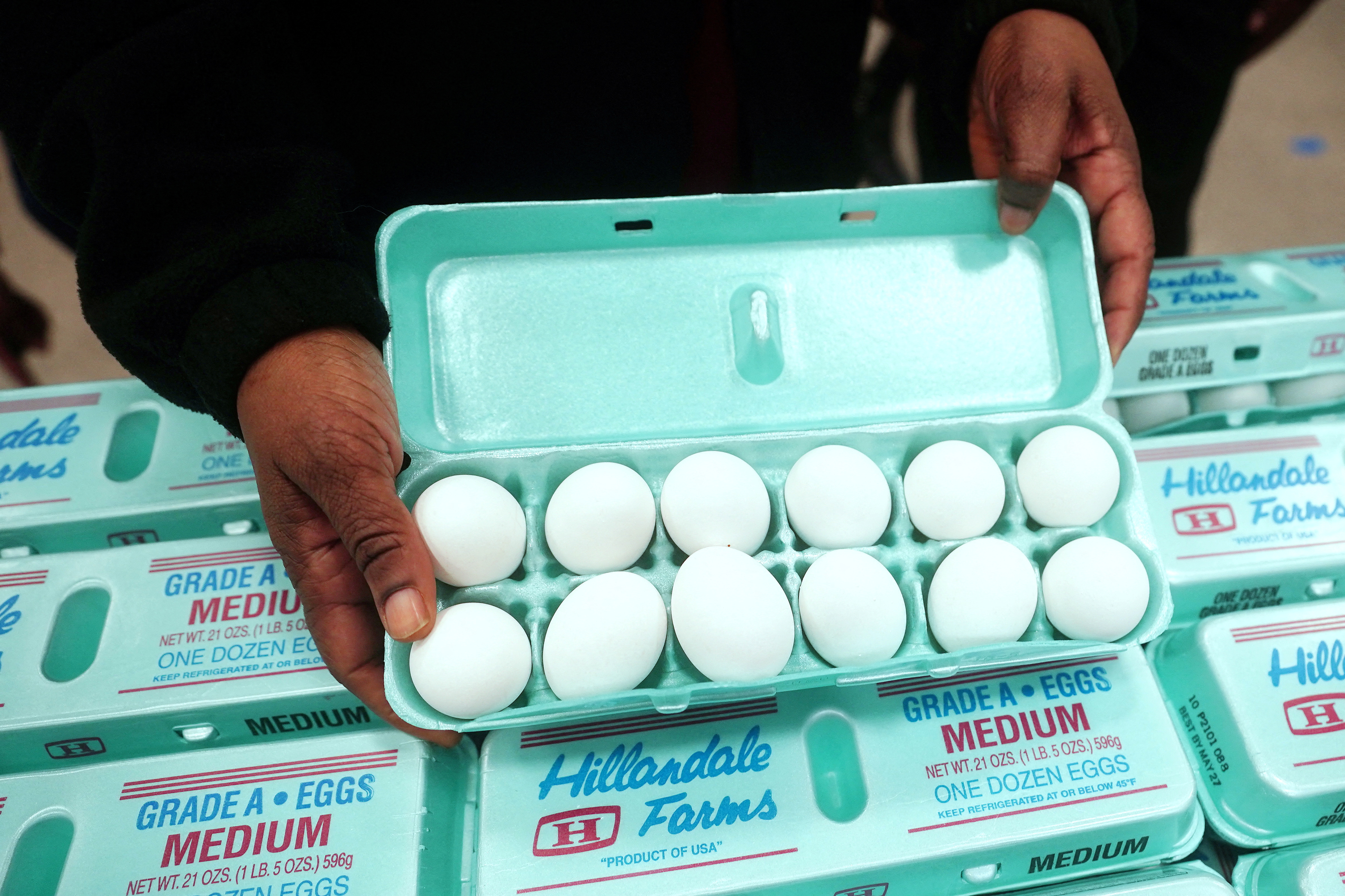 A carton of eggs are held by New York Attorney General Letitia James following her news conference about pandemic price gouging in New York City
