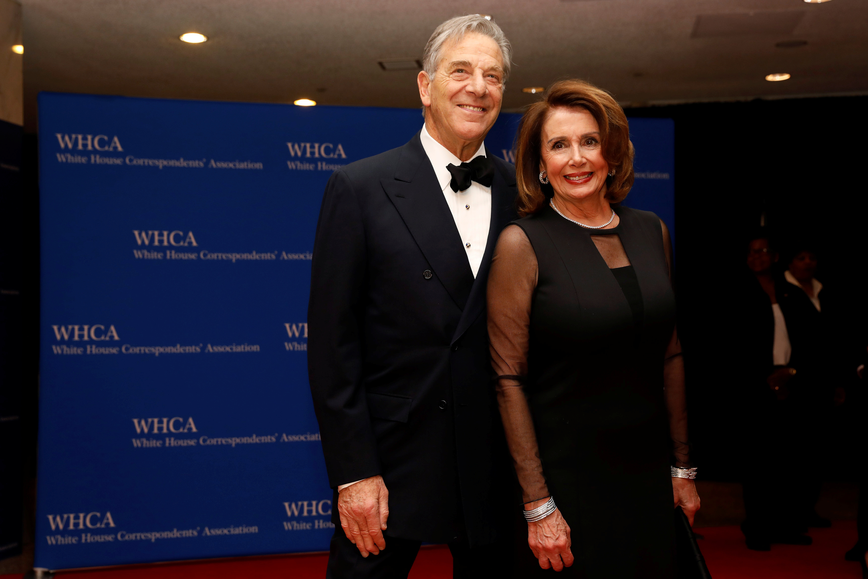 House Minority Leader Pelosi and her husband arrive on the red carpet at the White House Correspondents' Association dinner in Washington