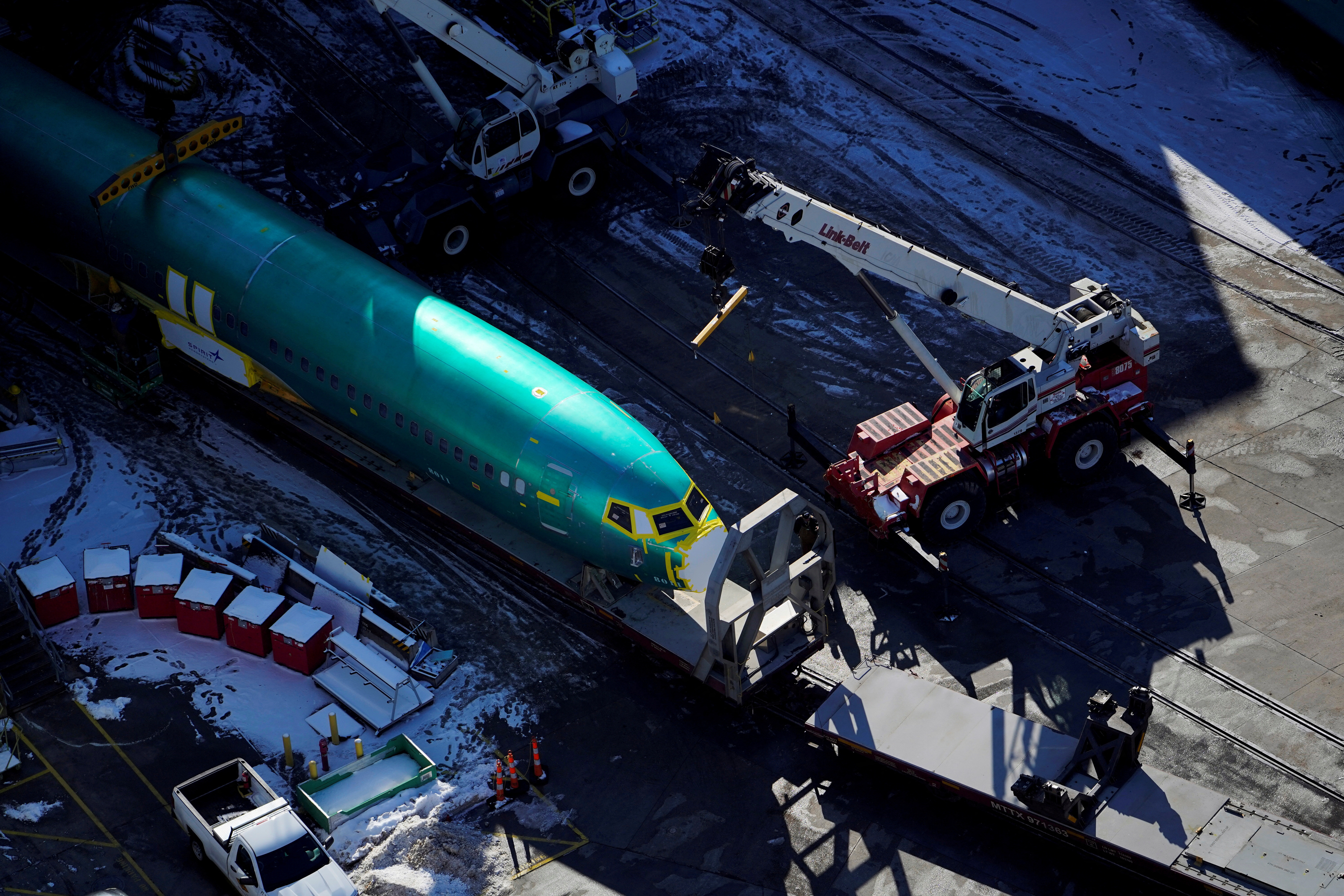 An airplane fuselage for Boeing's 737 Max is unloaded from a rail car at their top supplier, Spirit AeroSystems Holdings Inc, in Wichita