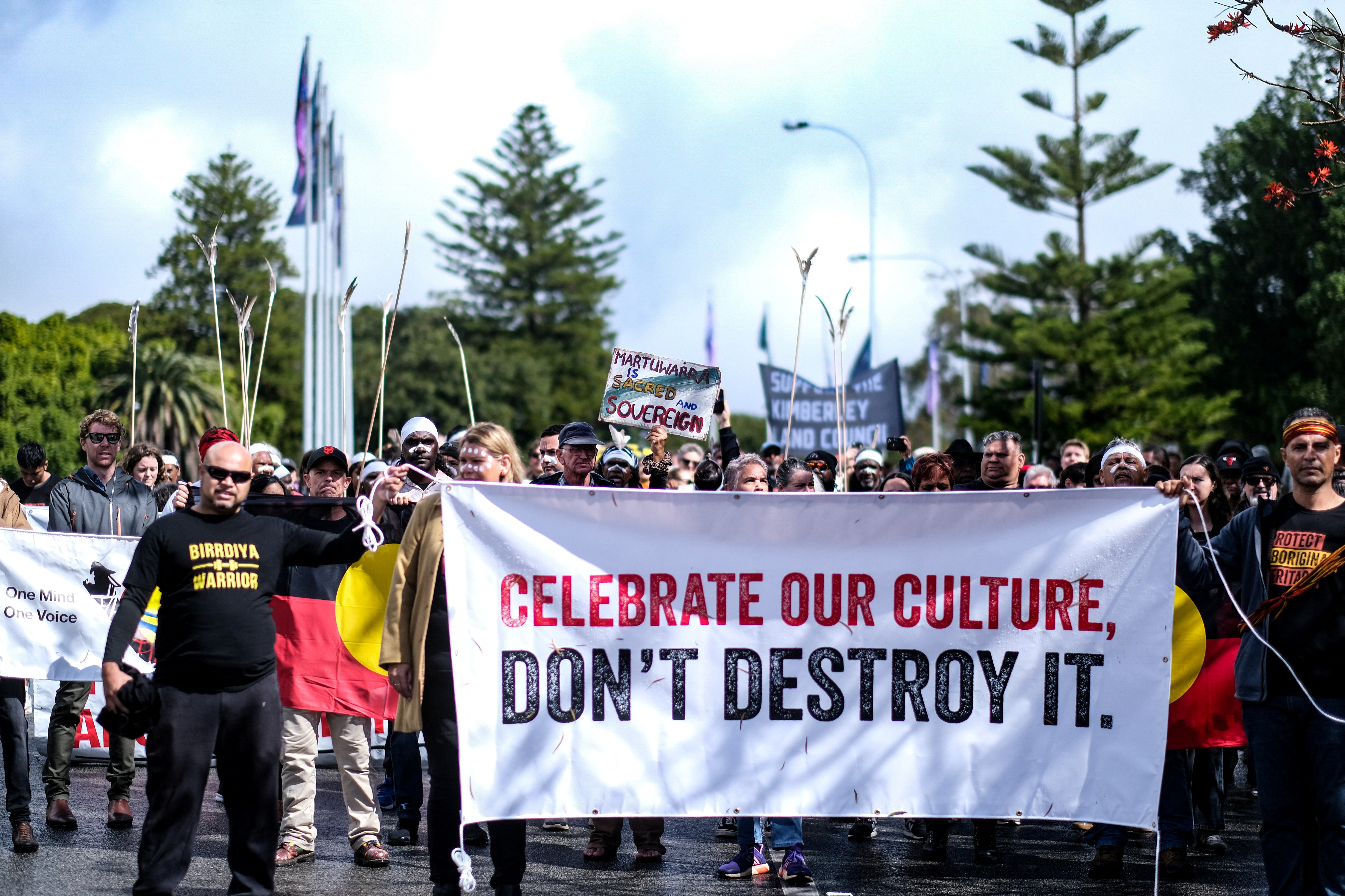 Aboriginal groups march against planned changes in heritage protection laws, in Perth