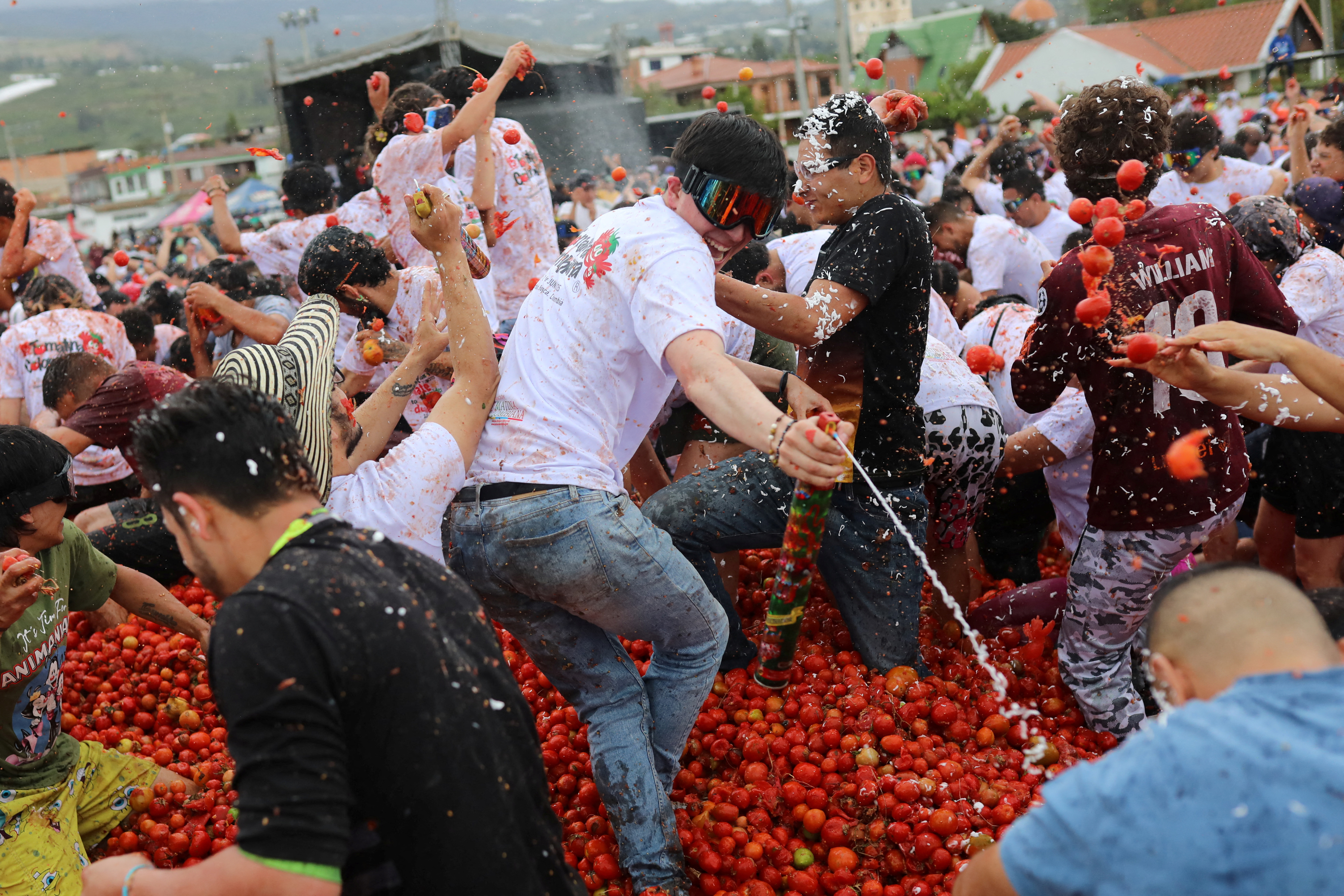 Tomatoes fly during Colombia's Gran Tomatina festival - June 2