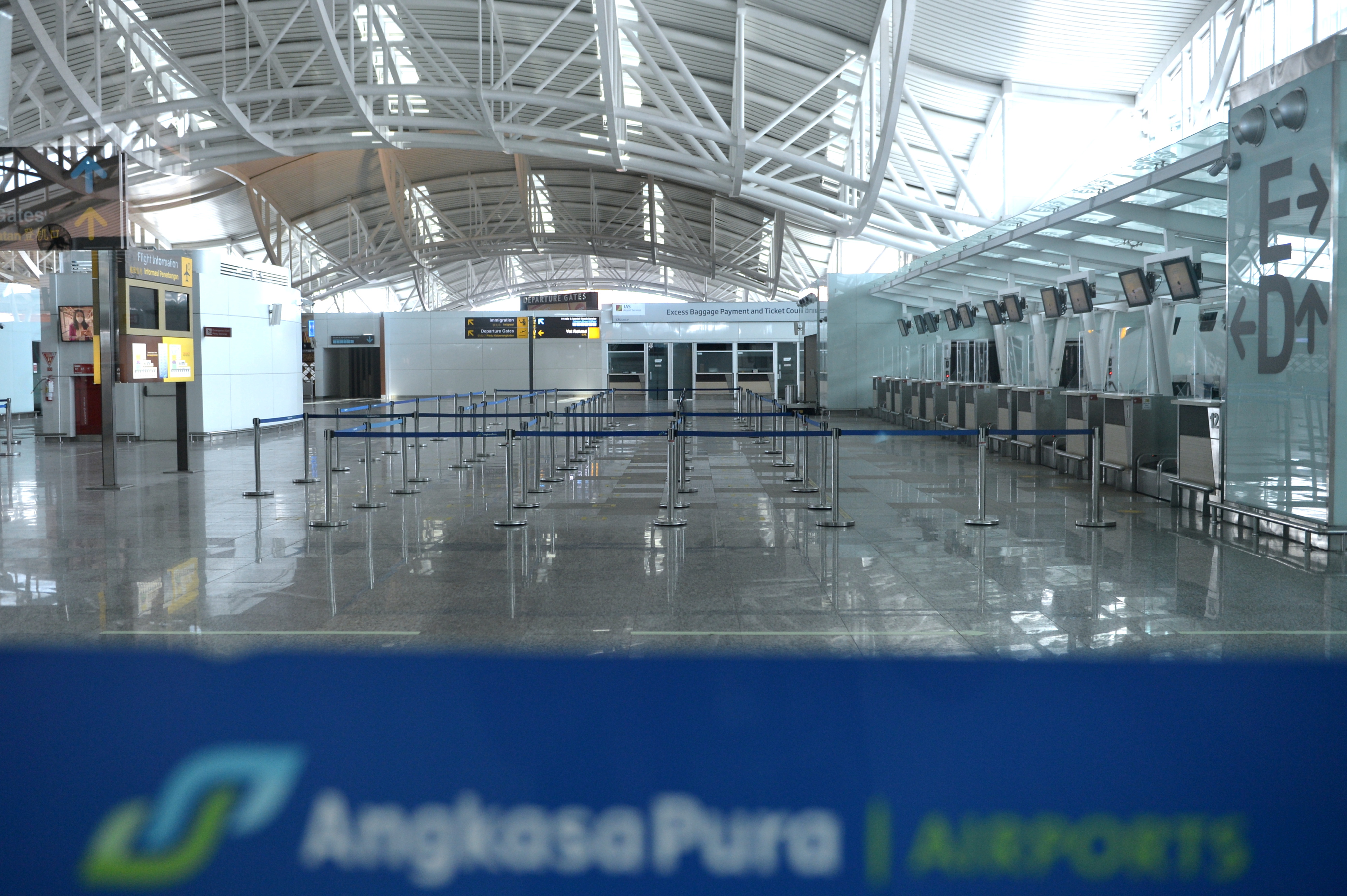 An empty view of Ngurah Rai International Airport is seen as Indonesia's resort island of Bali reopens for international flights, following border closures brought about by the coronavirus disease (COVID-19) pandemic in Badung, Bali, Indonesia October 14, 2021, in this photo taken by Antara Foto/Fikri Yusuf/via REUTERS/File Photo