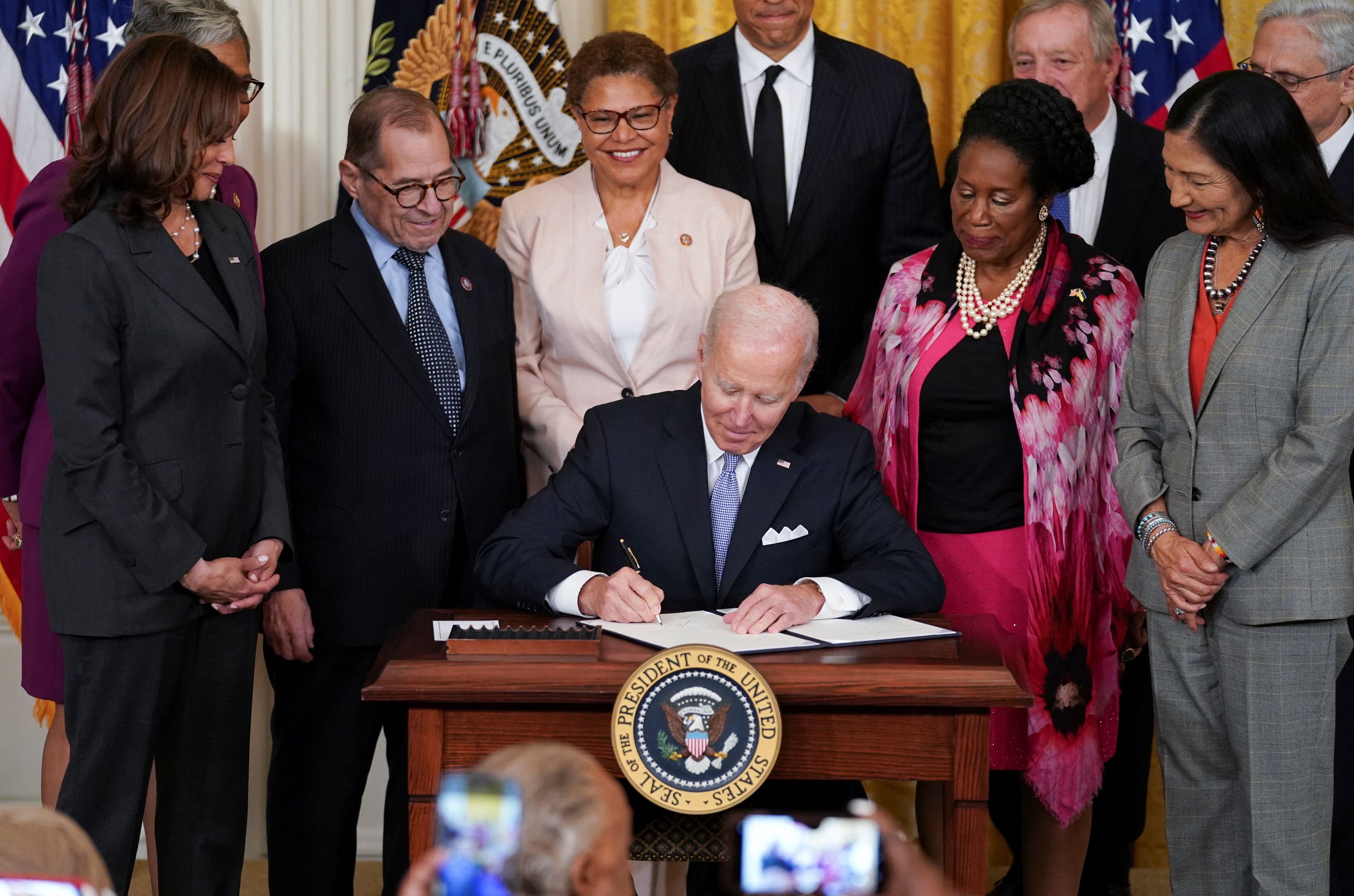 U.S. President Joe Biden signs an executive order to reform federal and local policing on the second anniversary of the death of George Floyd, in Washington