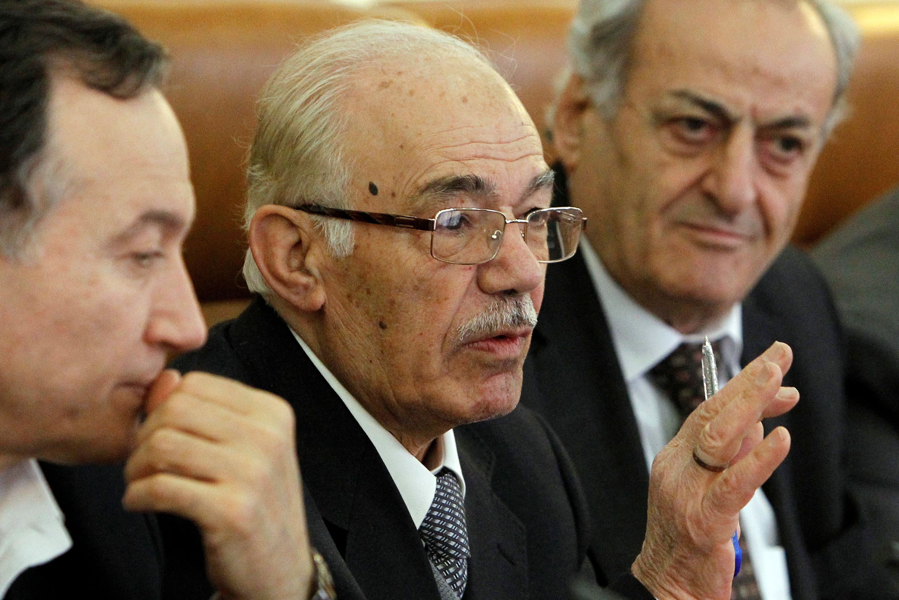 Hassan Abdul Azim (C), leader of a Syrian opposition delegation, speaks during a meeting with Mikhail Margelov, head of the Russian Federation Council's International Affairs Committee, in Moscow April 18, 2012. REUTERS/Denis Sinyakov