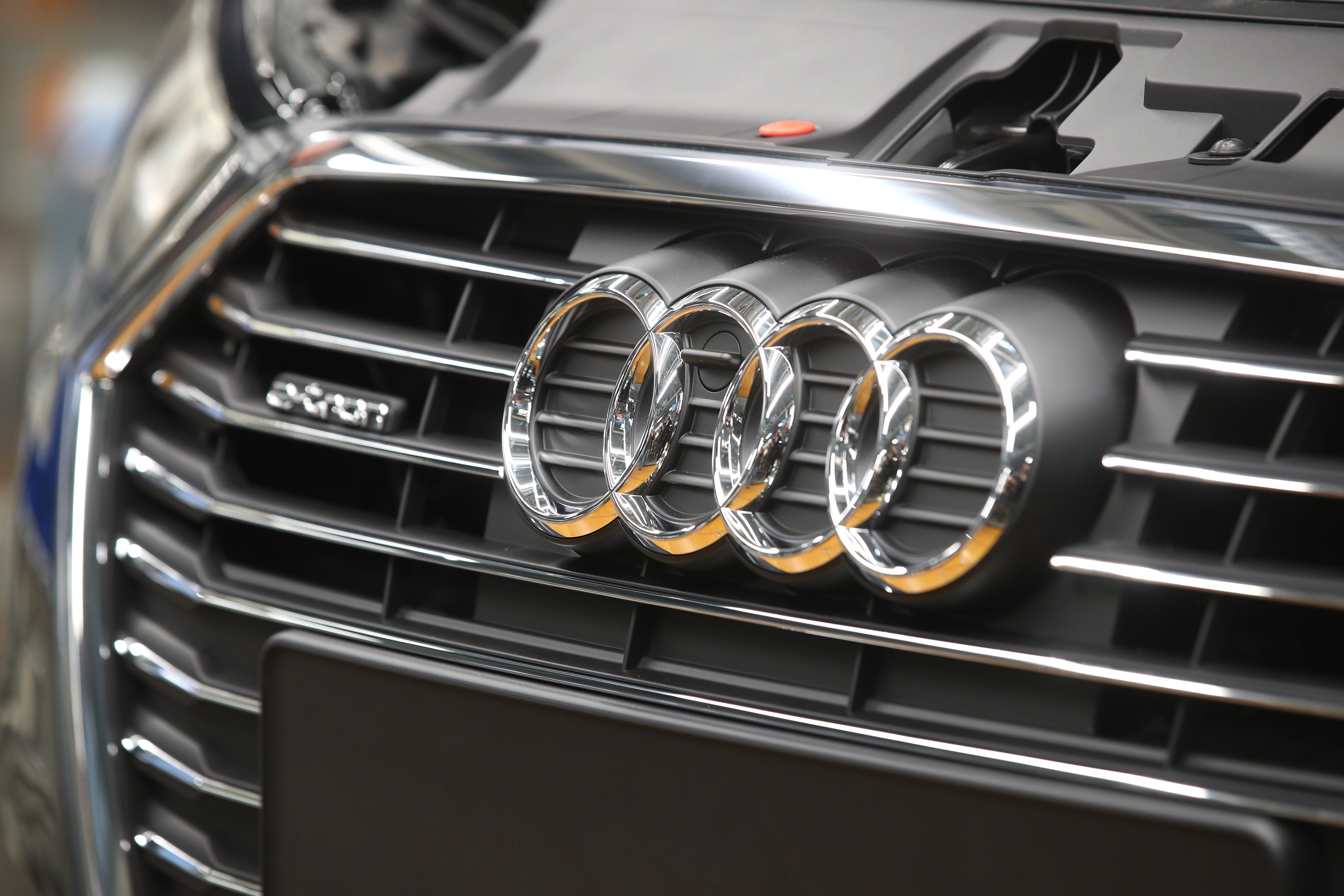 The Audi logo is seen on the car at the production line of the German car manufacturer's plant in Ingolstadt