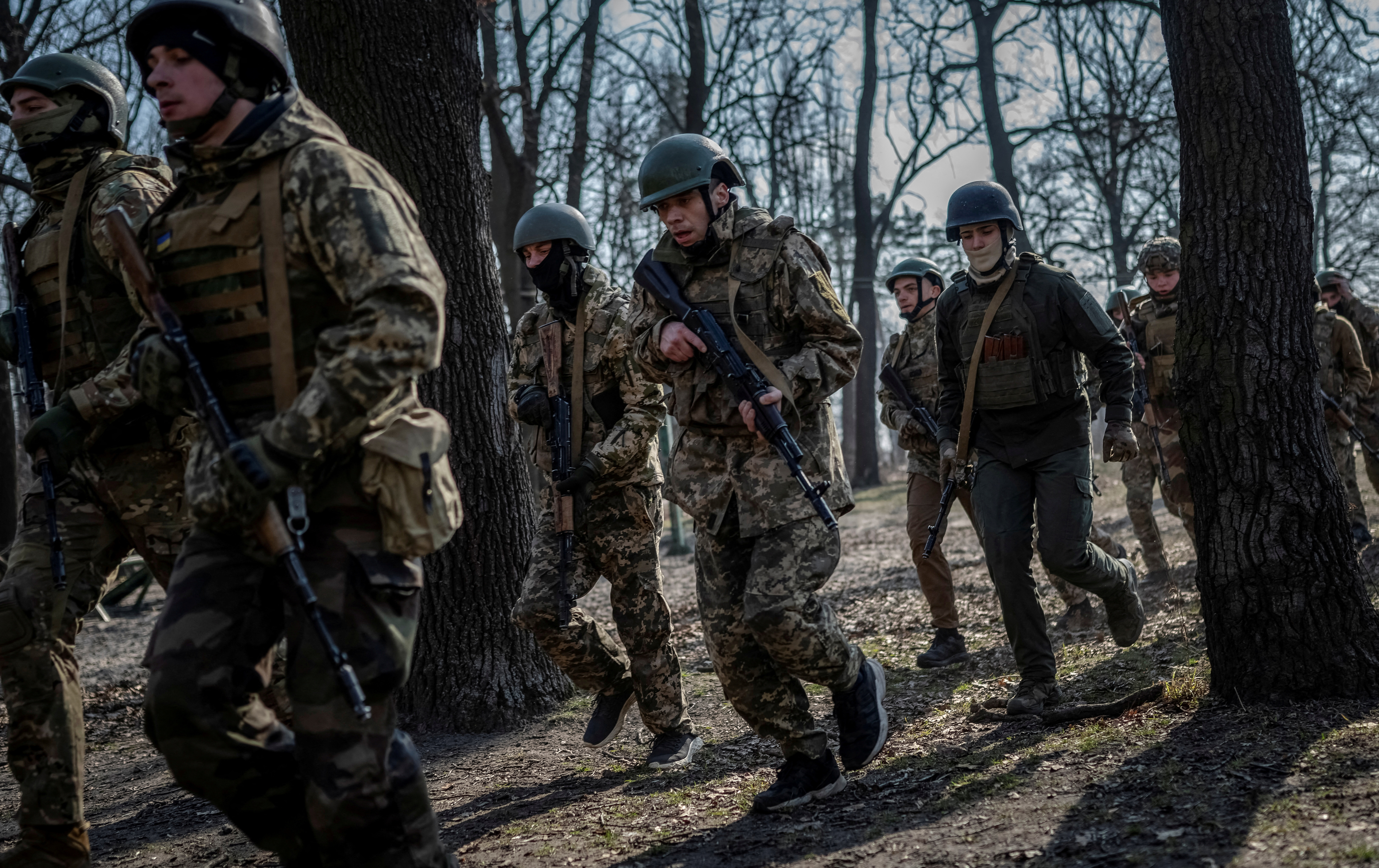 Volunteers who aspire to join the 3rd Separate Assault Brigade of the Ukrainian Armed Forces take part in a basic training in Kyiv region