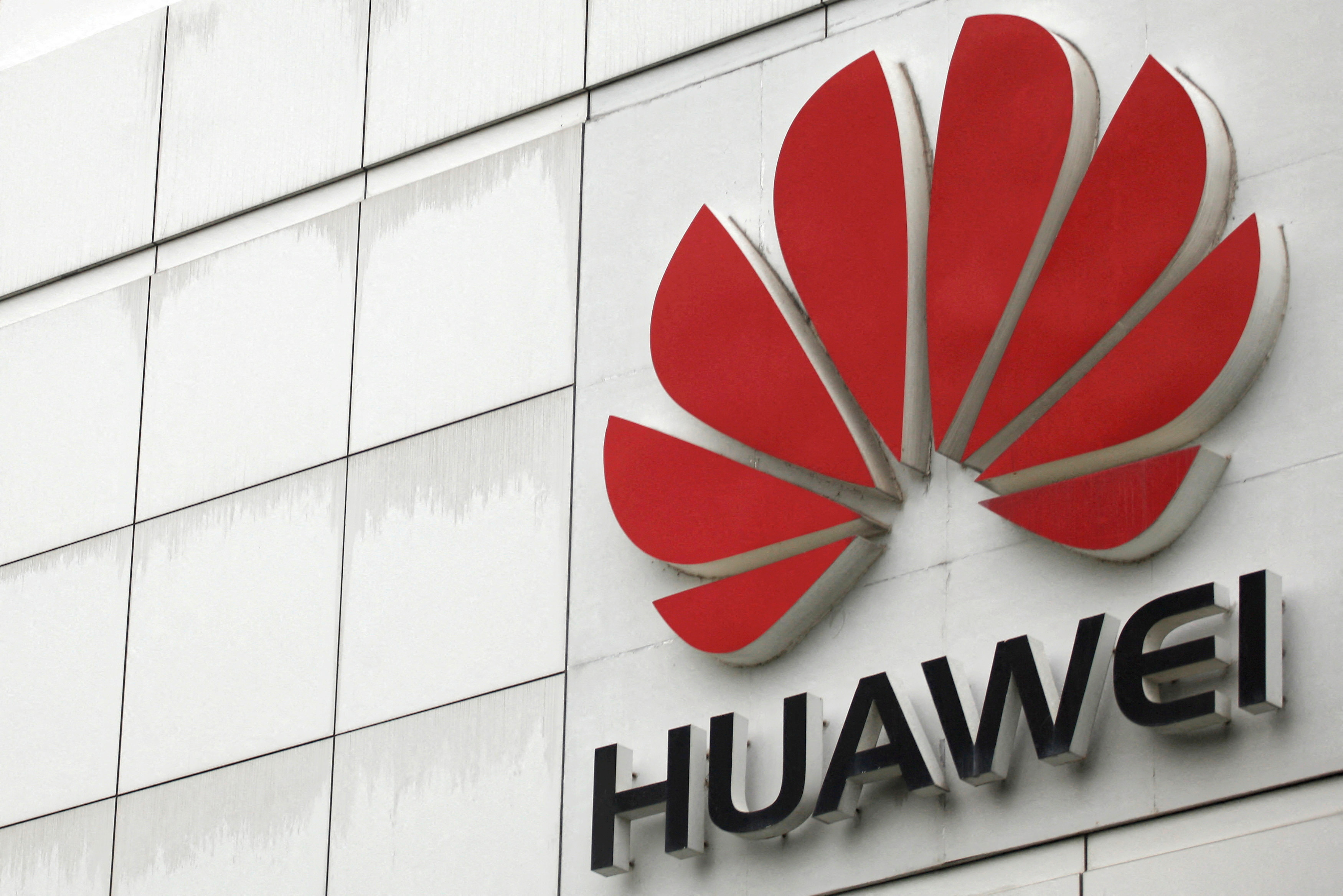The logo of the Huawei Technologies Co. Ltd. is seen outside its headquarters in Shenzhen, Guangdong province