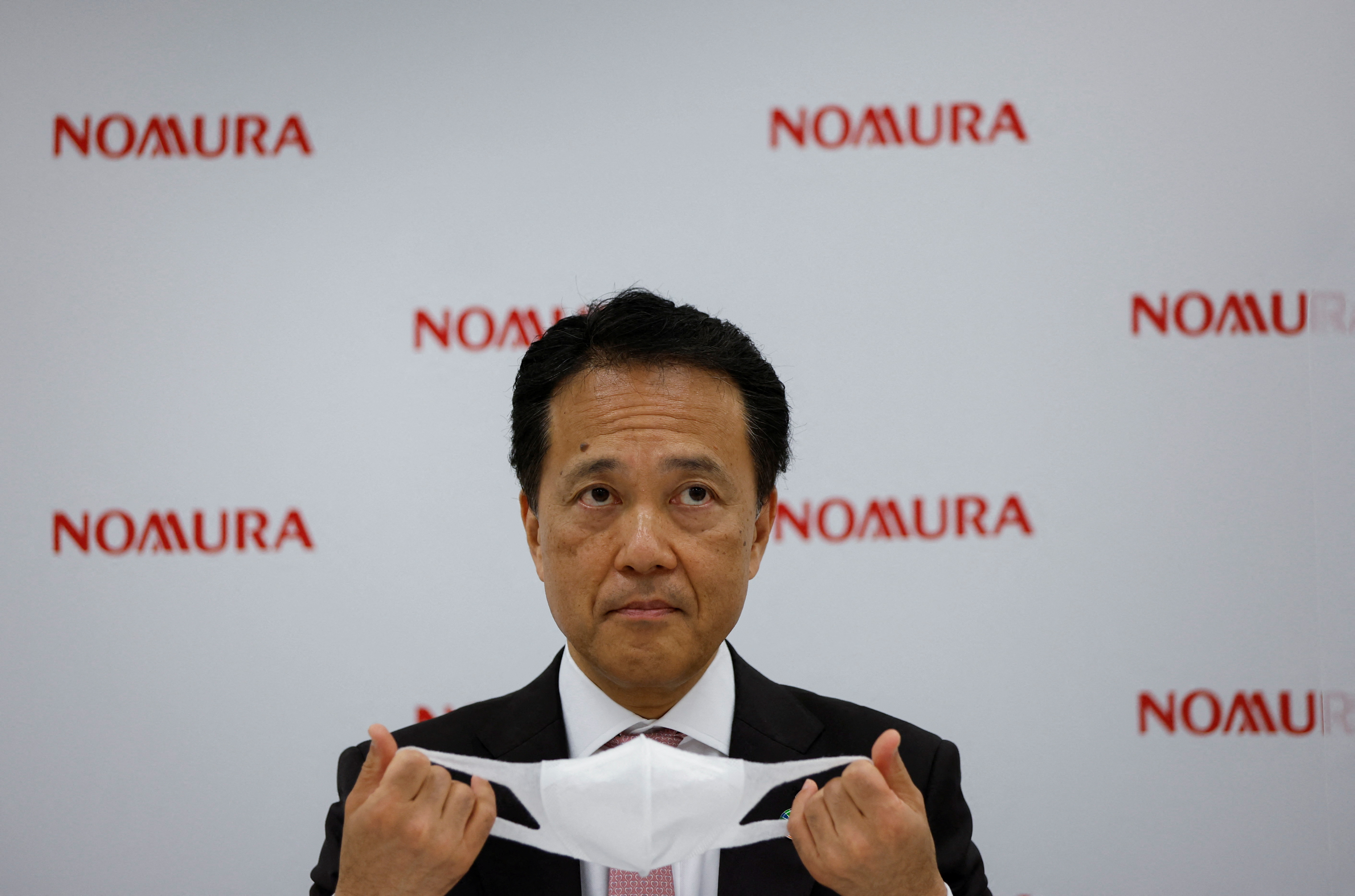Nomura Holdings Inc. Chief Executive Kentaro Okuda attends a news conference in Tokyo