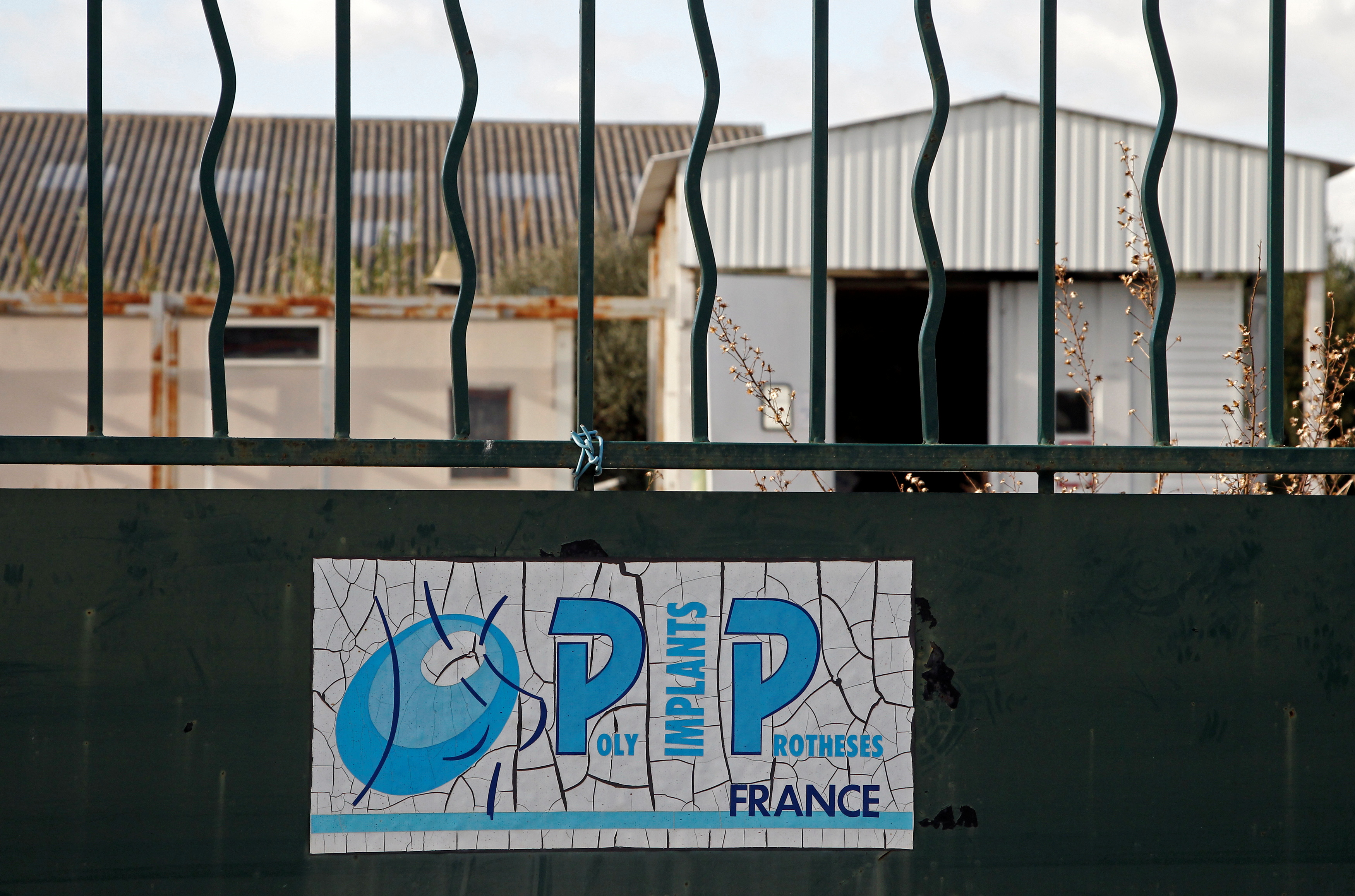 File photo: The locked entrance of the French company Poly Implant Prothese (PIP) building is seen in La Seyne-sur-Mer near Toulon, December 27, 2011. REUTERS/Jean-Paul Pelissier.