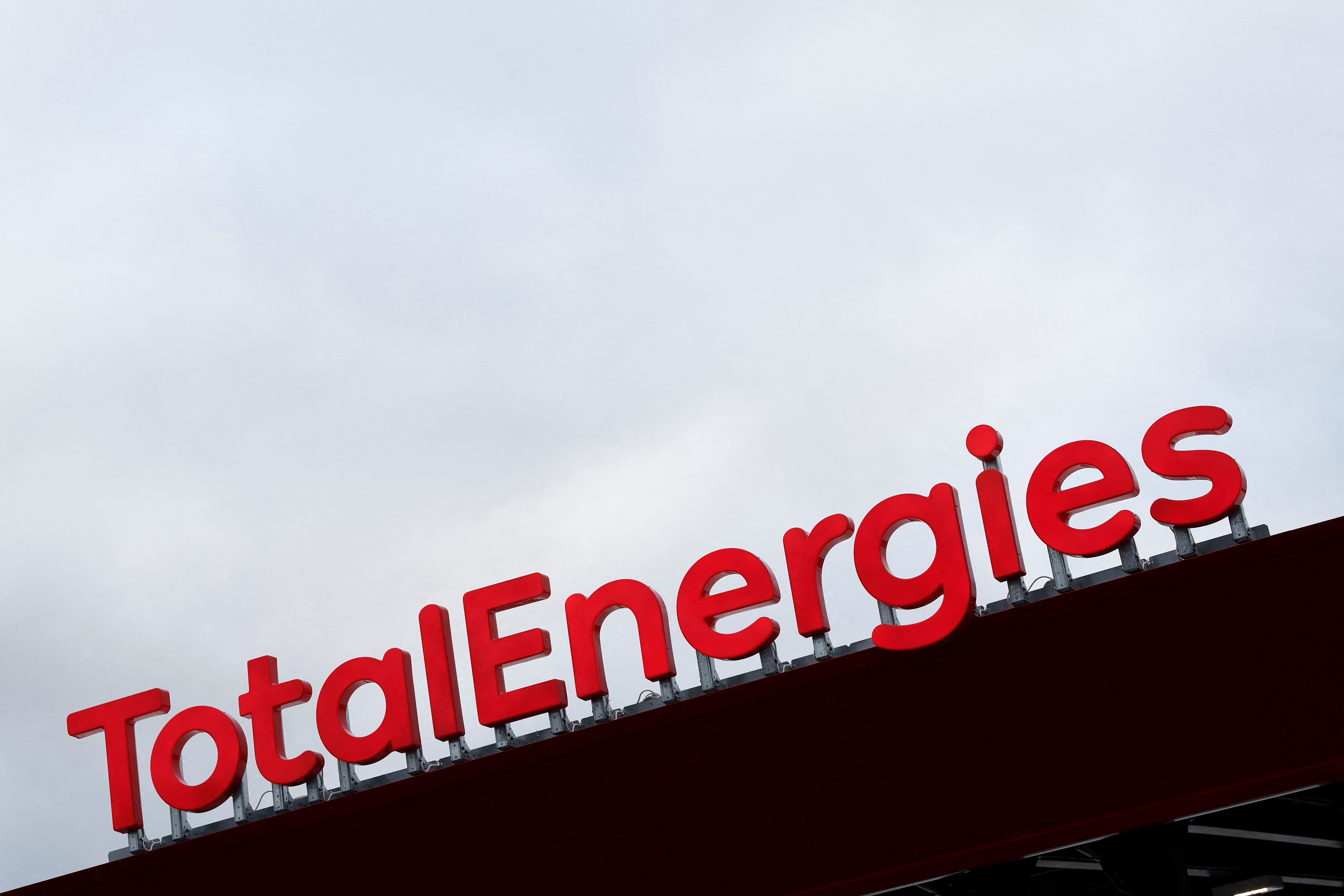 A signage for TotalEnergies is pictured at a gas station in Bosgouet