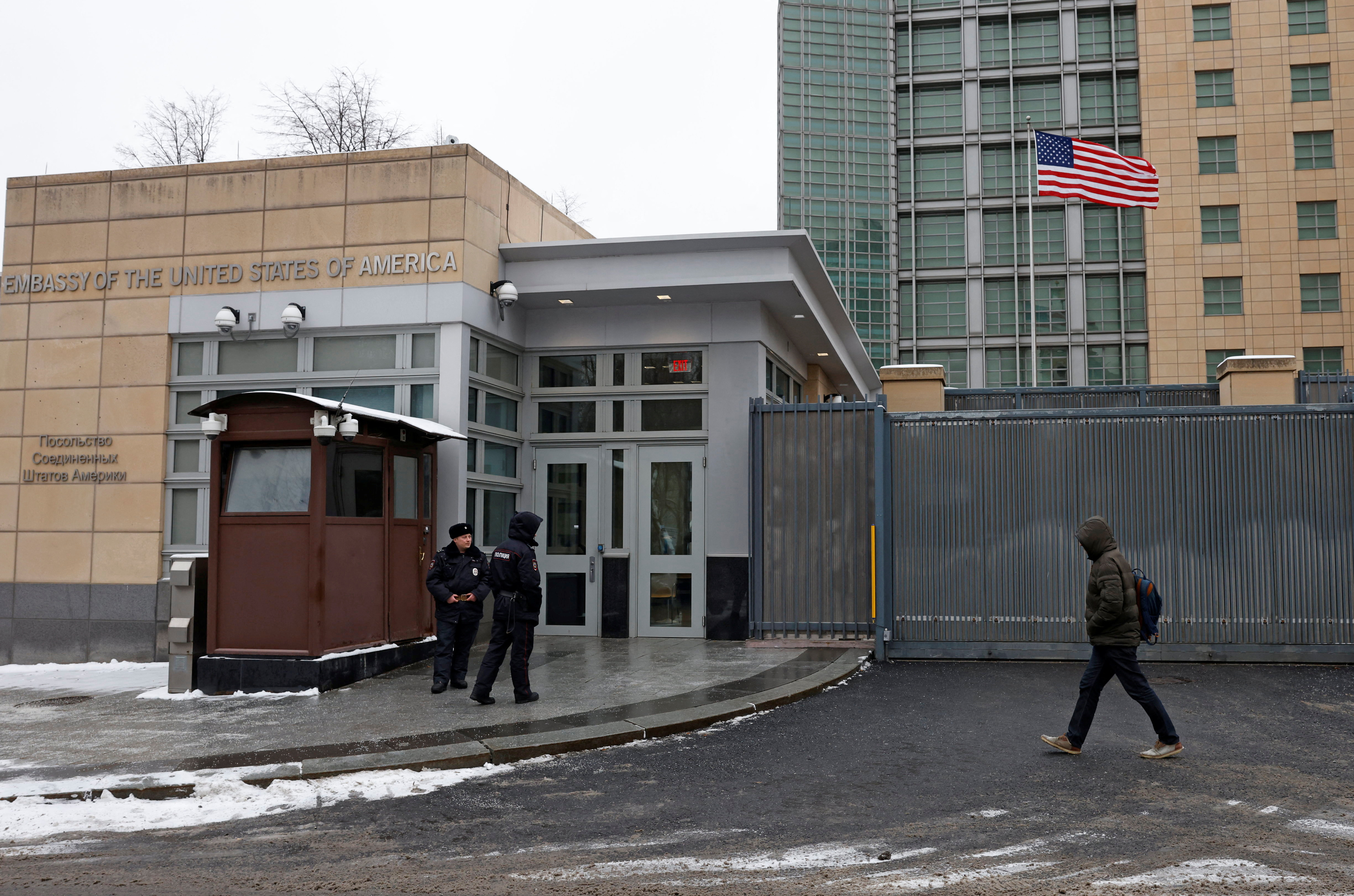 A man walks past the U.S. Embassy in Moscow