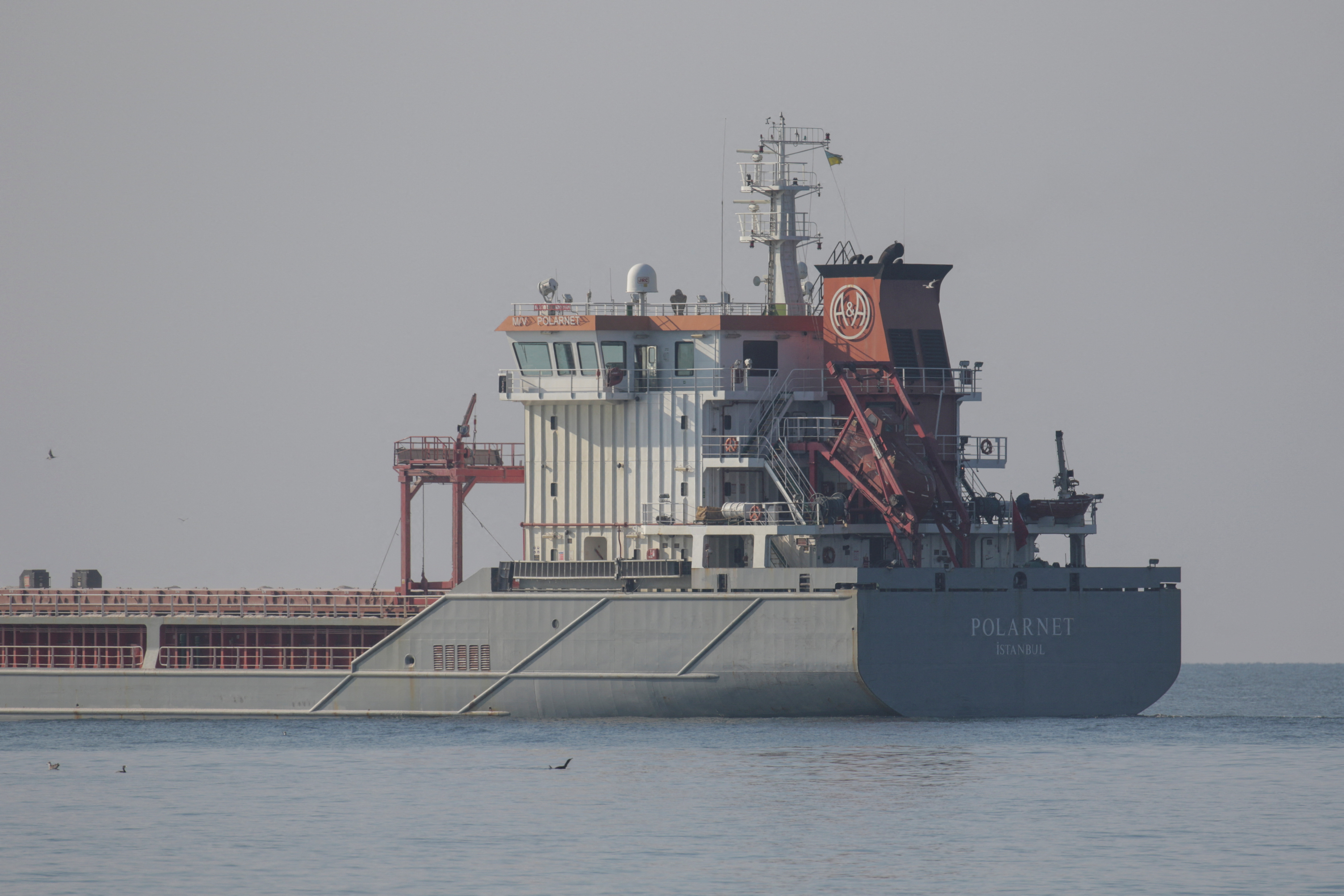The cargo ship Polarnet leaves the sea port in Chornomorsk